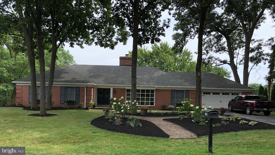 Perfectly positioned along the par 3 13th hole of the Penn National Founders course, this classic 1970 ranch offers timeless design with thoughtful modern updates. Renovated in 2016 and recently improved with a new heat pump, hot water heater, and refrigerator, and a roof in 2024, this home blends comfort, efficiency, and style.

Featuring 3 bedrooms and 2 full baths, the primary suite includes a beautifully tiled walk in shower.  Hardwood and tile flooring run throughout the home, creating a seamless living space. The inviting family room centers around a wood burning fireplace-perfect for cozy evenings. 

Enjoy Southern exposure that fills the home with natural light, while outside you'll find extensive landscaping and hardscape designed for both beauty and entertaining. The backyard fire pit offers the perfect setting to relax and take in the golf course views. 

Take advantage of a rare opportunity to own a move-in ready ranch home in a premier Penn National golf course location.