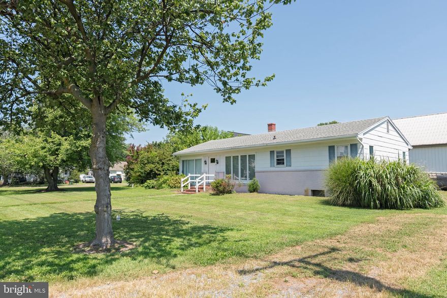 A fantastic opportunity awaits at 21749 Camper Circle in Tilghman, Maryland. This home is perfect for first-time buyers or investors looking for great value at an affordable price. It features central heating and air conditioning, three spacious bedrooms, and one full bathroom. Enjoy a large sunroom with tile flooring that is conveniently located next to the kitchen. The hardwood floors throughout the home are in excellent condition, adding to the charm of the open layout. Additionally, there is a full basement that offers numerous potential uses. This property is conveniently located within walking distance of marinas and three of the best restaurants in Tilghman, making it a must-see!