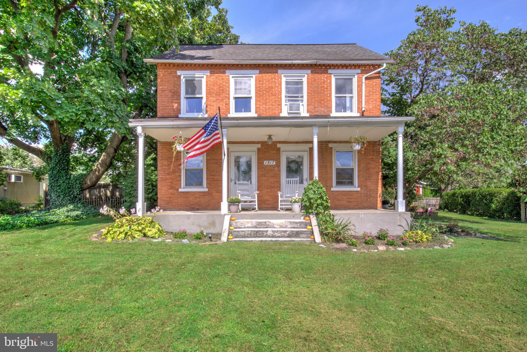 Sited on a spacious lot in Lititz, PA this beautiful, brick home is brimming with character and charm. Featuring two beautiful porches, 4 bedrooms and 1.5 bathrooms, charming wood floors, a spacious floor plan, open kitchen/dining area, first floor laundry and a 28X26 detached garage/workshop. The home has had numerous updates through the past few years including a septic system, updated electrical and a heating system. Outside you'll find your own secluded retreat! This home boasts a spacious, flat yard perfect for outdoor entertaining, play, or simply relaxing in peace. Whether you're hosting summer barbecues, gardening, or enjoying a quiet morning coffee, the level lot provides endless possibilities. Schedule your showing today!