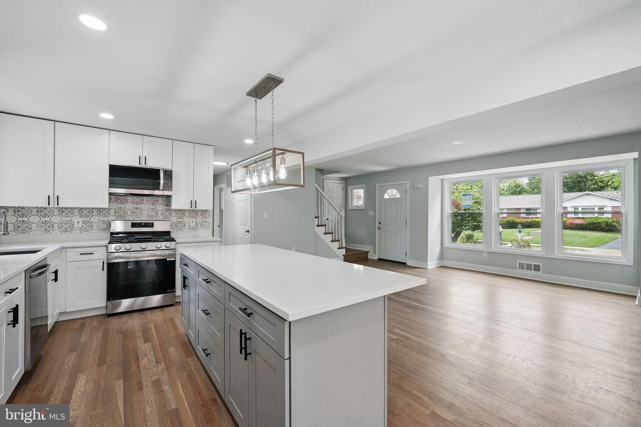 Open House: Sunday, July 27th 2-4pm
This fully renovated charmer offers a perfect blend of modern updates and cozy charm, featuring five spacious bedrooms—two upstairs, two on the main level and one in the basement—and three full bathrooms. Stylish LVP flooring flows seamlessly throughout, enhanced by recessed lighting that adds a warm, modern touch. The heart of the home is a stunning, open-concept kitchen boasting an 8-foot island, sleek finishes, and ample space for cooking, gathering, and entertaining. Brand-new windows fill the space with natural light, while the finished basement provides flexible living options—perfect for a playroom, home office, or den. A welcoming fireplace adds coziness to the main living area, and the large fenced-in backyard offers a private outdoor retreat. With driveway parking for four, this home blends comfort, function, and beautiful design in every corner.