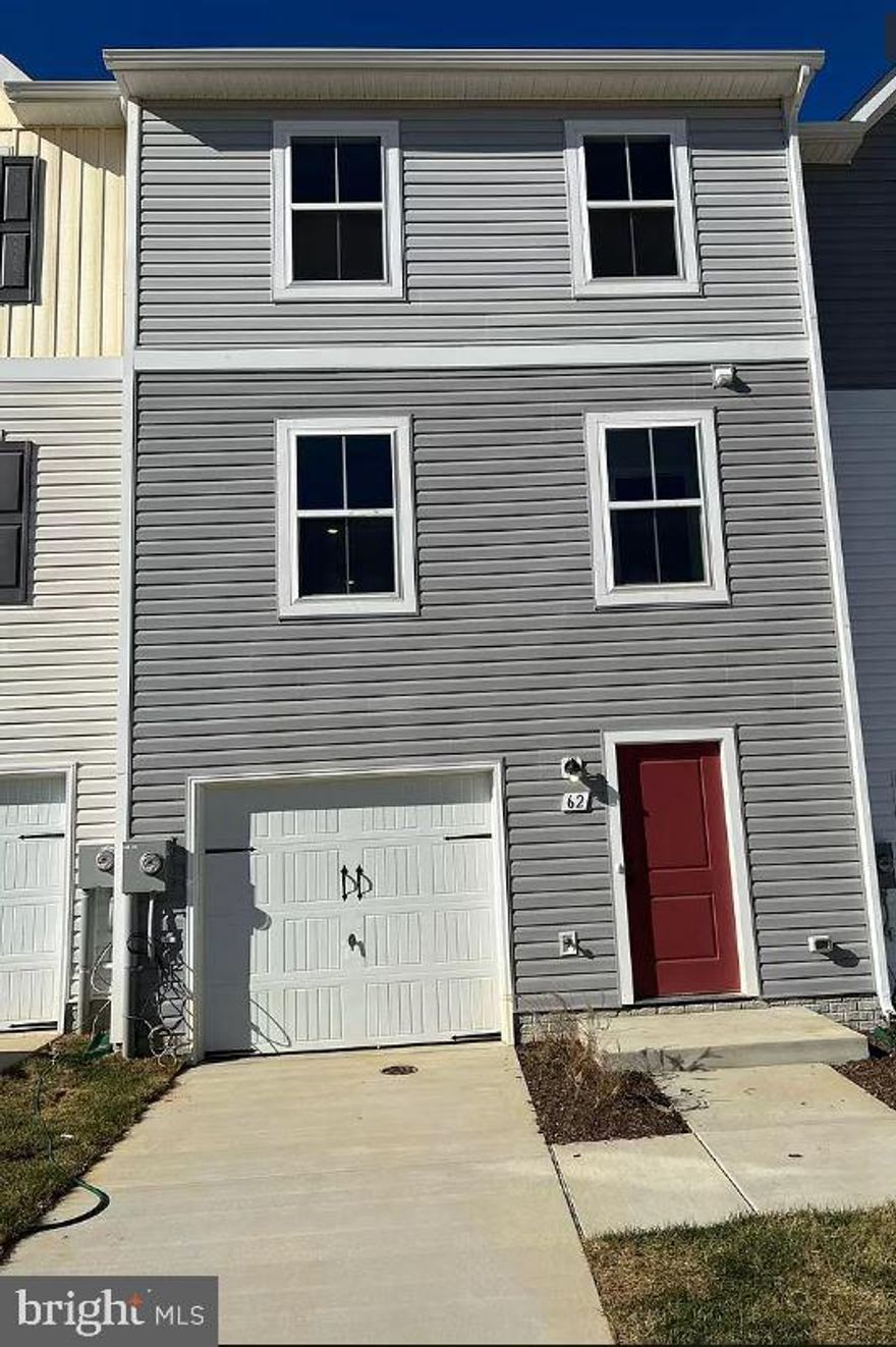 This Property is located at Dillon Farm in Hedgesville, WV. This 3-level Townhome has 3 Bedrooms, 2.5 baths, Granite Countertops, and fully upgraded appliances with Farmhouse package upgrades. This home has easy access to many nearby stores, Burger King, Martins, and other stores. Also easily accessible to Pharmacy/Medical centers / Route 9 and I-81. Perfect location for those who work in Virginia, WV, PA, and Maryland. It’s the center point of all 4 states for easy commute. This Home has Front Entrance Attached Garage with Inside Access. In the Entry level, Finished Recroom / Office Room/Bedroom(you use it as the 4th Bedroom)... The main level comes with an open-concept floor plan which has a Living room / Kitchen and Dining. The kitchen has fully upgraded appliances (Double door steel Refrigerator, Dishwasher, and Microwave) with Granite countertops. The 3rd level has a Master Bedroom with a Master Bath, and 2 Children's Bedrooms (A total of 3 Bed Rooms and 2 Full baths). Laundry Washer /Dryer is in Unit, Energy efficient windows, Gas for Water heating/ Room Heating. Pets are allowed. The security deposit and first month are due when you sign the lease. May not last long at this Home in the Market, Call or schedule the tour !!!