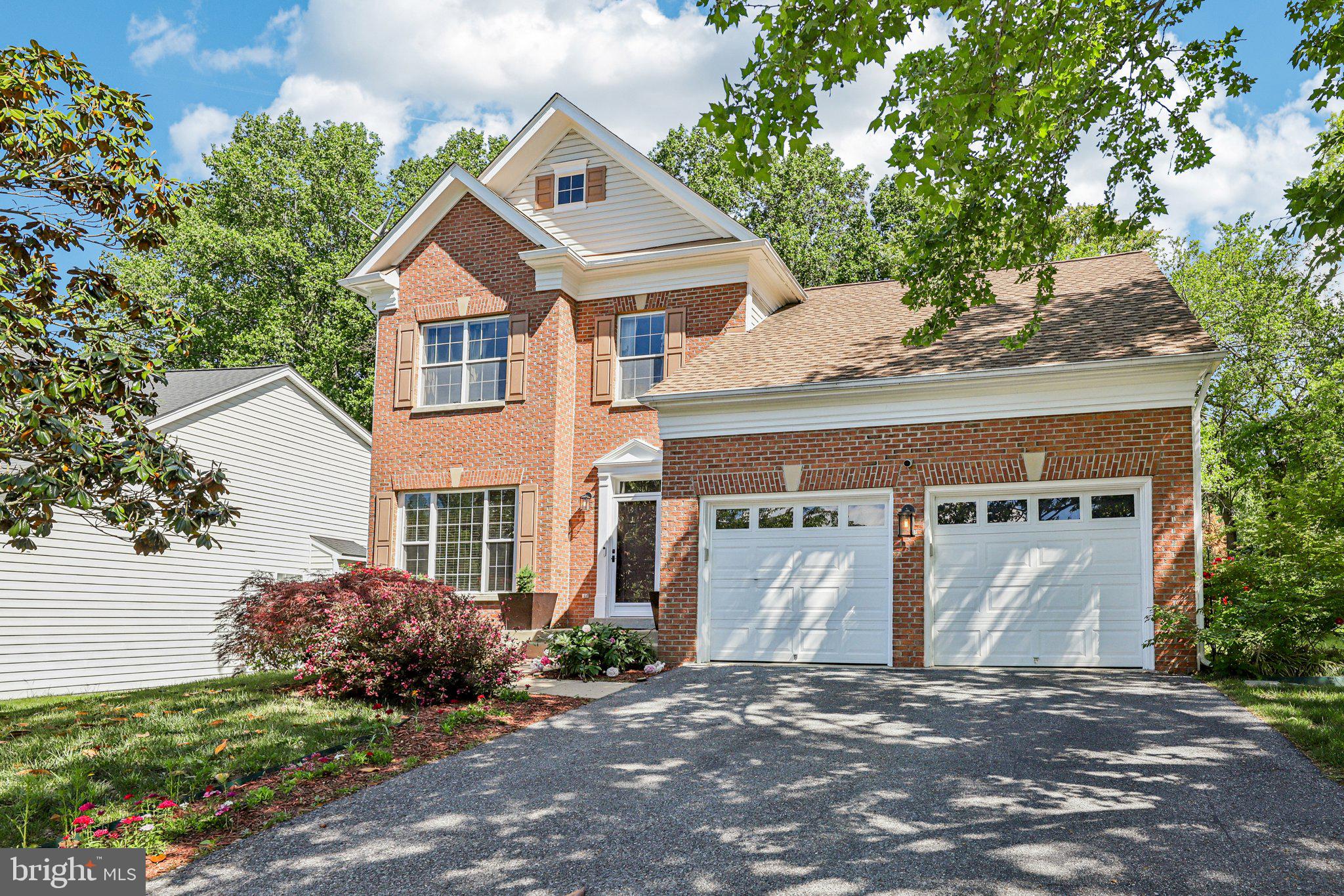 Gorgeous brick colonial offering 4 spacious bedrooms, 3.5 bathrooms, and a 2-car garage. The open-concept kitchen features updated appliances, pendant lighting, kitchen island, and doors to the back deck, perfect for entertaining. A stylish powder room is conveniently located on the main level. Upstairs, you'll find 3 generously sized bedrooms and 2 full bathrooms. Primary bedroom includes en suite bathroom. The finished basement features a 4th bedroom, full bath, and a versatile space ideal for a rec room, office, or gym. Additional upgrades include a brand-new front door, new HVAC system, new toilets, new sump pump, updated flooring, and an in-ground sprinkler system. Enjoy the outdoors on the back deck or gather around the fire pit in the backyard. This beautifully maintained home blends comfort, functionality, and style—inside and out!