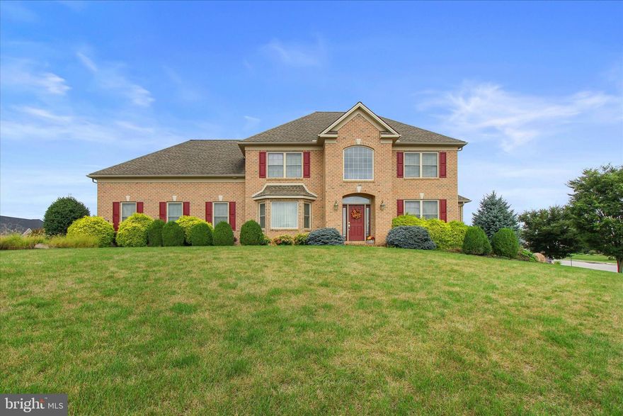 Custom built Jeff Henry, all brick, 2 story home, situated on a lovely manicured .87 acre parcel in New Brittany. First floor main suite features his and her bathrooms, plus new vinyl plank flooring in bedroom and baths. Dramatic 2 story foyer. Brazilian cherry hardwood flooring in foyer and dining room. First floor kitchen features: Cherry cabinetry and Corian countertops; smooth top electric range and eye level oven. Large pantry closet, built in microwave, dishwasher and side by side refrigerator. Full kitchen in the basement features: Electric stove, built in microwave and side by side refrigerator. Perfect party room or possible in law quarters, by adding a shower or tub shower; half bath already in that level, walk-out to exterior! 2 individual heating and AC units for 1st floor and 2nd floor, plus basement level is on 1st floor unit with separate thermostat. Pella windows and doors. Central vacuum. Garage area has an individual heater. One car and Two car, plus motor home garage. New tankless hot water heater. Don't miss the opportunity of owning this outstanding home!  Feel the joyful ambience of this beautiful family home.