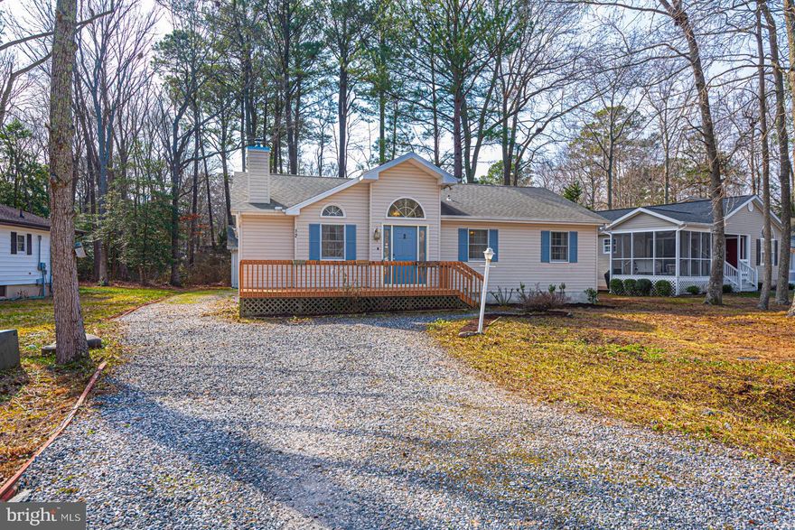 Discover this charming 3BR, 2BA rancher nestled on a quiet street in Ocean Pines! Built by Steen Homes, this home offers an open floor plan with cathedral ceilings, a cozy gas fireplace & a breakfast bar in the kitchen. Enjoy outdoor living with front & rear decks, plus plenty of off-street parking. Additional features include a detached 2-car garage, pull-down attic stairs with floored storage, Leaf Filter gutter protection & a newer roof. Home is being sold as-is! Make this your next stop & don’t miss this opportunity to make it your own!