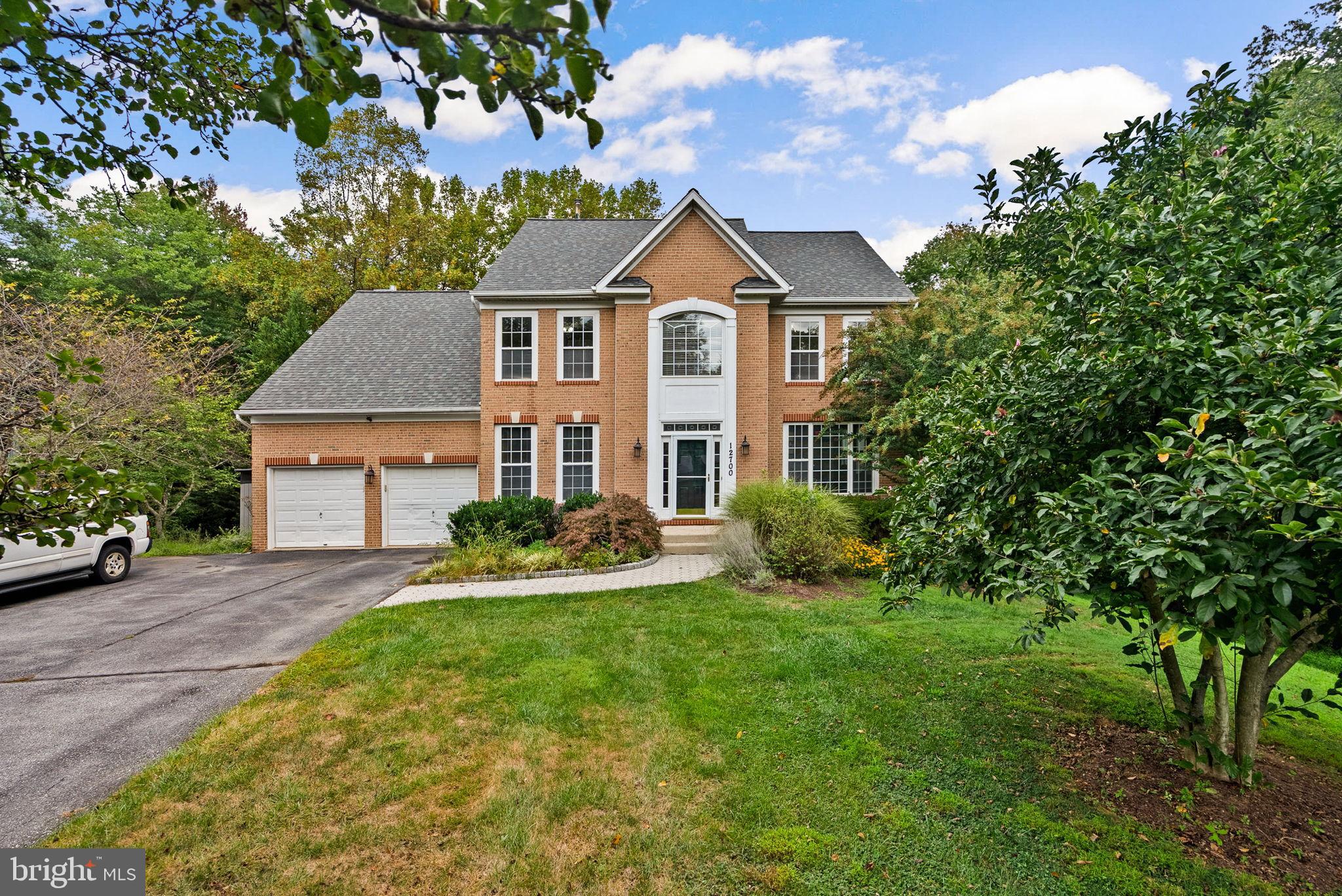 Nestled in the serene Timbercreek Estates, this stunning Colonial-style residence offers an exquisite blend of luxury and comfort, perfect for those seeking an elevated lifestyle. With a major renovation completed in 2015, this home boasts modern elegance while retaining its classic charm. Step inside to discover a spacious layout that seamlessly combines functionality with style. The heart of the home features a beautifully designed kitchen, complete with a generous island, built-in microwave, gas range, and wall oven, making it a culinary haven for any home chef. The combination kitchen and dining area invites gatherings, while the adjoining living space, enhanced by a cozy fireplace, creates an inviting atmosphere for relaxation and entertainment. The home air conditioning system was just replaced this month to keep the air perfect for any preference. This residence offers four well-appointed bedrooms and three and a half bathrooms, including a luxurious soaking tub in the master suite, providing a perfect retreat after a long day. Thoughtful interior features such as plush carpeting, ceiling fans, and a dedicated bar area add to the home's warmth and sophistication. The fully finished walkout basement extends your living space, offering endless possibilities for recreation, a home office, or a cozy media room. With direct access to the outdoors, it's an ideal spot for entertaining or enjoying quiet evenings under the stars. Outside, the property is set on a generous 0.72-acre lot, providing ample space for outdoor activities and gardening. Enjoy the fresh air on the expansive deck or patio, perfect for summer barbecues or morning coffee. The attached garage with front entry and additional driveway parking ensures convenience for you and your guests. With a prime location just under a mile from public transportation, this home combines tranquility with accessibility with 270 access less than 2 miles away. Experience the best of both worlds in Timbercreek Estates, where luxury living meets a welcoming community atmosphere. This property is not just a house; it's a place to create lasting memories and enjoy a lifestyle of comfort and elegance. Don't miss the opportunity to make this exquisite residence your own!