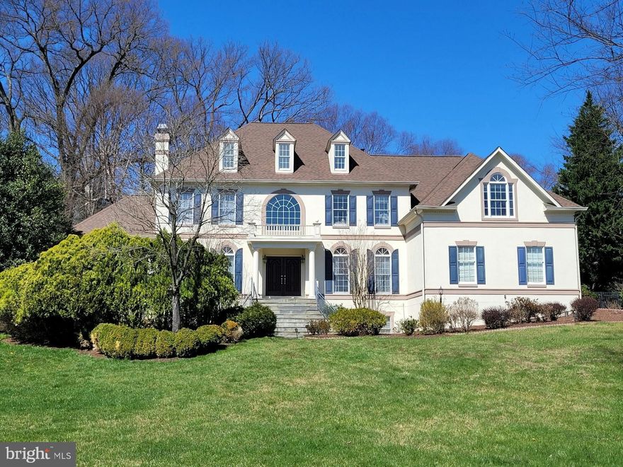 Fabulous Stately Georgian Colonial on nearly an acre in the wonderful community of Oakton Retreat!!!  Many features and upgrades throughout this large 7,000 sq.ft.  home including moldings, hardwood floors, recessed lighting, two-story ceilings, coffered ceilings, French doors, palladium windows, skylights, three gas fireplaces.... and, best of all, a STUNNING Clive Christian kitchen with Wolf, SubZero and Miele appliances, as well as an extended island with bar stool seating, recessed lighting and marble counters.  The kitchen opens wonderfully to the breakfast area and the family room filled with two-story windows and a gas fireplace.   Your guests will be greeted by a covered slate porch, a living room with a two-sided fireplace, a central open wooden staircase and a welcoming sunroom.   The quiet office area has classic built-in cabinetry.  The home's quality and grandness continue upstairs with a large primary suite with a sitting area and two walk-in closets.   The primary bath has new lighting, a window over the Jacuzzi brand soaking tub, a separate shower and dual sinks.   There is a princess suite with a skylight and it's own private bath.  Bedrooms three and four share the third full bath and have recessed lighting and ceiling fans, like most rooms throughout the home.   The lower level is also terrific with a recreation room with the third gas fireplace, a game area with doors to the rear yard, a bonus sunny second office and the fifth bedroom with the fourth full bath.  There is also an exercise room and a fully finished storage area.  WOW!!!  This home shines and is filled with today's sought-after features.  There is a large deck off the breakfast area and a stone patio off the sunroom.   The fenced private rear yard receives western sun.   The sought-after Oakton area has trees, trails, streams AND convenience!!!   Located near the Town of Vienna, I-66, Tyson's Corner you are just minutes to shops, restaurants and all the Northern Virginia job centers.