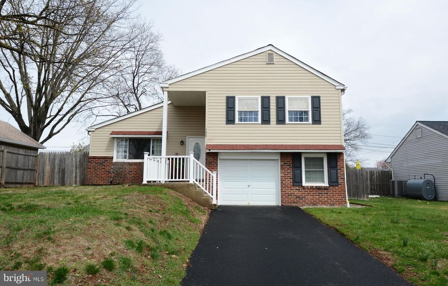 Here is a beautifully updated Split Level in the sought-after Souderton Area School District!
A move-in ready home featuring a fresh, neutral palette and refinished hardwood floors that flow throughout.   A spacious living room—complete with recessed lighting and plenty of area for your oversized furniture. The open dining area offers seamless indoor-outdoor living with sliding glass doors leading to the rear deck and a fully fenced-in backyard.  The kitchen is outfitted with white cabinetry, granite countertops, a glass tile backsplash, stainless steel appliances, and wood-look tile flooring for added durability and style.
The family room, half bath, and laundry/storage room are located on the lower level. There is also direct access to the one-car attached garage via the laundry room.
The upper level has three bright and clean bedrooms with neutral decor and refinished hardwood flooring.  There is also access to an attic for additional storage needs.  A full bath with tub/shower combo completes this level.
A fantastic single-family home located in a vibrant, walkable town filled with local restaurants, breweries, bars, art galleries, and attractions like The Broad Theater and The Montgomery Theater.  A great home in an even better location—don’t miss it!