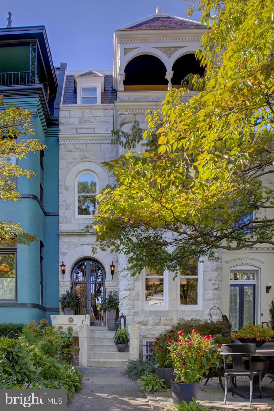 OPENS CANCELLED - UNDER CONTRACT! Behold this stunning renovation where Capitol Hill grande dame meets Restoration Hardware – to captivating effect!  Behind the carved marble façade of this impeccably maintained home lies a real showstopper:  grand spaces thoughtfully and beautifully conceived for serene daily life and entertaining crowds large or small.  The casually elegant living and dining rooms, boasting lovely fireplaces and built-ins, are clearly defined yet maintain an open plan feeling.  The kitchen / family room is a temple to gourmet cooking and fine design, with a soaring ceiling, gas fireplace and massive south-facing glass doors leading to a sublime rear deck ready for al fresco adventures.  The second floor primary suite is the perfect retreat – a vast yet cozy chamber with a large bay window, wood-burning fireplace, separate dressing room and spa-like bathroom.  Notice the multiple storage spaces and laundry off the second floor hallway.  The third floor offers three bedrooms, one with en-suite bathroom, plus a hall bathroom.  The English basement rental unit has been completely renovated to perfection and ready to house overflow guests or generate rental income.  This is the Hill at its best – a perfectly-located grand historic home with character and period details galore yet firmly rooted in the 21st century!