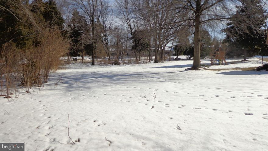 Beautiful Half Acre Building Lot in Established Neighborhood, With No HOA!