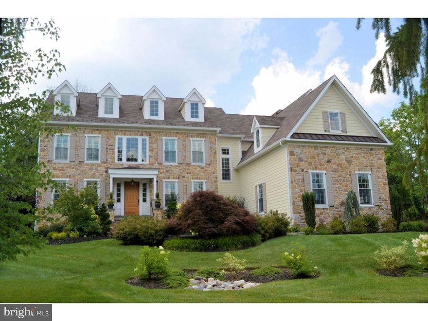 Builder's Own Home says it all!     GRACIOUS AND GRAND ???.WARM AND INVITING  "Welcome home to Elegance" Dramatic Estate Home located in prestigious 'Gwynedd Valley'. The setting is complemented by mature stately hardwood trees and professional landscaping with irrigation system; timeless flagstone front walkway and paver patio. 1.87 acres, very private cul-de-sac location in Lower Gwynedd Township. This sophisticated and classic home offers an Open, Bright Floor Plan with spectacular High Ceilings.  Meticulous craftsmanship throughout, Andersen 400 series windows, real stone and Hardie Board exterior siding; Incredible millwork and architectural features include Custom Brookhaven Cabinetry, magnificent Walnut hardwood floors, paneled wainscoting, multi piece crown moldings and built ins.  Two staircases access the second floor. The main stair leads to the Master Suite appointed with a multi-level crown molding coffered ceiling, Calcutta marble bath, Rohl Faucets, claw foot tub, oversized shower with two heads and split vanities.Gourmet kitchen with twin refrigerator/freezers, 6 Burner Wolf Range, Shaw's Farm Sink and SS prep sink, two dishwashers, wall oven and wine refrigerator make this a chef's dream.  A nearby computer desk area perfect for homework, projects and general organization. The Kitchen extends into the beautiful sun-drenched Morning Room and Family room with 13' coffered ceiling. The Dining Room is located in the rear of the house overlooking the beautiful landscape and connected to the Kitchen by the Butler's Pantry; a perfect layout for entertaining.  Geo thermal heating and cooling system with 5 Zones for maximum efficiency. A 20 KVW generator, audio video system, Sonos sound system; network wiring and Lutron Lighting system complete this "smart" home. The 6th bedroom or (Au pair Suite) with a full bath and kitchenette is located in the finished lower level and accessed via the rear staircase. There is also a gym, entertainment space and wine cellar in the lower level. Extensive designer appointments enhance this signature residence.  If you deserve the finest ?Welcome Home!