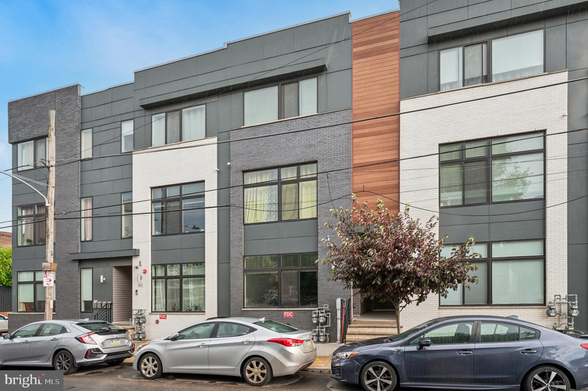 An efficient and affordable bi-level one bedroom in East Kensington! Welcome to 514 W Montgomery #2, a 1 BD/1 BA condo that is fit for homeowners and investors alike. From dark oak hardwood flooring and LED flush-mount lighting to an L-shaped kitchen and 11-foot ceilings, this unit was built with simplicity and taste in mind. The first floor boasts an open living area and a kitchen area connected by a breakfast peninsula. The kitchen features gray shaker cabinets, a penny tile backsplash, stainless steel appliances, pendant lighting, quartz countertops, and under cabinet lighting. The large front windows drench the main floor with sunlight - your houseplants will thrive! The lower level features a spacious bedroom, stacked laundry closet, and a full bathroom. The primary bedroom also has a large walk-in closet making storage (and shopping habits) no trouble at all! Central AC. Low HOA. Steps from Human Robot, Say No More, Grocery Outlet, LMNO, Suraya, and more. Minutes from all major highways and the Philadelphia International Airport. Oh, and did we mention there is approximately 4 years remaining on the tax abatement? Schedule your showing today!