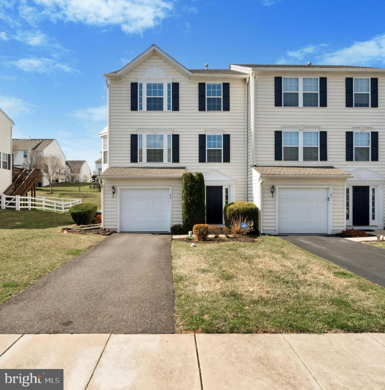 Back on Market due to no fault of Seller or Property! Now is your chance to own23 Bayberry Lane! Located in the highly desirable Coventry Glen community. This stunning end-unit townhome boasts a bright, open floor plan, a spacious walk-out daylight basement, and a sunroom off the kitchen, with windows in every direction flooding the home with natural light.
Step inside to the entry-level foyer, where you'll find the perfect drop zone, complete with a coat closet and a powder room. From here, access the fully finished daylight basement, an ideal space for entertaining family and friends.
On the second level, the open-concept layout flows seamlessly from one space to the next. The kitchen features granite countertops, ample cabinet space, a seated island, and overhead recessed lighting. All stainless steel appliances have been recently replaced, including the stove (2 years), refrigerator (3 years), and microwave and dishwasher (just a few weeks old).
Adjacent to the kitchen is a large, sunroom bump-out, bringing in plenty of natural light. From here, step out onto the large composite deck, the perfect place to entertain guests, enjoy a summer bbq, or enjoy a morning cup of coffee. The spacious living room offers plenty of room for furniture, with windows on both sides enhancing the bright and airy feel.
Upstairs, you'll find a generously sized primary suite featuring vaulted ceilings, a large walk-in closet, and an ensuite bath with a soaking tub, separate shower, and private water closet. The secondary bedrooms are larger than those in many other units in the neighborhood, providing ample space for family, guests, or a home office.
Located near playgrounds, walking trails, and just a short drive from local shopping. Make your appointment, and make your offer!