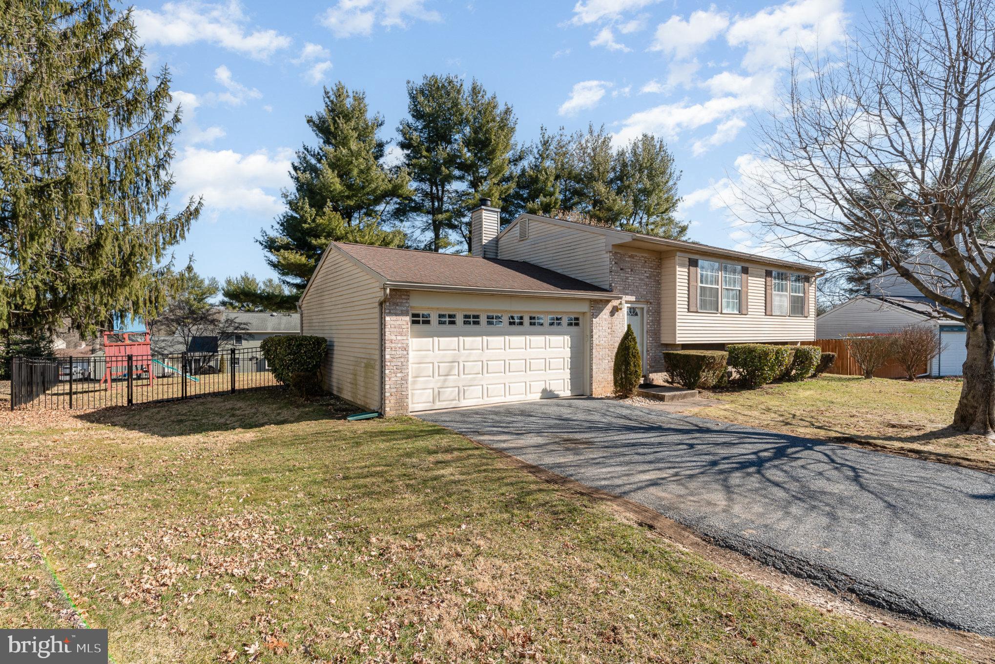 Stunning 3-Bedroom Bi-Level Home in Top-Rated Cumberland Valley School District is Move-In Ready with Modern Upgrades & Serene Outdoor Oasis. Welcome to this impeccably maintained split-level home, perfectly situated in the sought-after Cumberland Valley School District. Boasting a 2-car garage, a spacious fenced yard, and thoughtful updates throughout, this property offers both comfort and style for modern living. Recent Upgrades for Peace of Mind: 2022: Two luxuriously renovated bathrooms (modern fixtures, elegant finishes). 2020: Durable aluminum fencing with an oversized gate for privacy and convenience. 2019: High-efficiency gas furnace and central AC (energy-saving and reliable). Kitchen (2008): Fully remodeled with quartz stone countertops, custom cabinetry featuring soft-close pull-out shelving (perfect for easy access and organization!), ceramic tile backsplash, stainless steel appliances, and a sunny eat-in area that flows seamlessly to a deck ideal for indoor-outdoor entertaining. Main Level Highlights: Open-Concept Family Room: Cozy up in the carpeted living space, perfect for relaxation. Primary Suite: A tranquil retreat with easy access to a renovated full bath. Second Bedroom: Versatile for guests, a home office, or a nursery. Lower-Level Haven: Charming Sitting Area: Anchored by a rustic wood-burning fireplace, creating a warm ambiance. Flexible Media/Bonus Room: Ideal for movie nights, a playroom, or a home gym. Third Bedroom & Full Bath: Perfect for teens, in-laws, or a private workspace. Laundry Area: Conveniently located and tucked away. Outdoor Perks: Expansive Deck: Overlook your lush, fully fenced yard, a safe haven for kids, pets, or summer barbecues. Garage Upgrades: New door (2020) and automatic openers for effortless access. Additional Value: New roof (2010), water heater (2014), and meticulous upkeep ensure this home is turnkey. Why You’ll Love It: This home blends modern updates with functional living spaces, all in a prime location. Don’t miss the chance to own a property that’s ready to welcome your family’s next chapter. Schedule your showing today. This gem won’t last long!