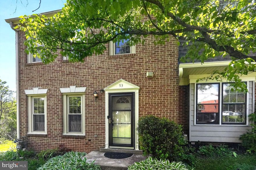 Meticulously loved and maintained brick-front end-unit townhome in established Brighton East—featuring refinished hardwood floors, custom millwork, major recent upgrades, and two private outdoor retreats that truly set this home apart.
The main level opens to a gracious foyer with wainscoting and crown molding, flowing into formal living and dining spaces accented by a crystal chandelier and elegant dentil trim. The updated kitchen features cherry cabinetry, granite countertops, stainless steel appliances, and a pass-through to the breakfast room, where custom built-in shelving and an entire wall of storage cabinets create the perfect everyday gathering space. Sliding doors lead to an upper deck overlooking a peaceful tree-canopied yard.

Upstairs, three spacious bedrooms include a primary suite with dual closets and an ensuite bath. The  private WALKOUT lower level basement offers substantial additional square footage of living space, featuring additional versatile room ideal for guest use, a home office, gym, or flex space, a full bathroom, massive recreation/living area with a wood-burning brick fireplace and French doors. This lower level with the extra room opens to a pergola-covered brick patio framed by mature landscaping, creating a rare private outdoor sanctuary.

This move-in-ready home also includes ALL MAJOR EBIG TICKET ITEMS and exterior updates completed within the last THREE (3) years, including a Trane HVAC system with transferable warranty, ROOF, WATER HEATER, FRONT DOOR, STOREM DOOR, FENCE, and brand new washer and dryer—offering DECADES of true peace of mind for the next owner.

Community amenities include pool, tennis courts, basketball courts, and parks all within walking distance. Conveniently located just minutes from I-270, I-370, ICC, Shady Grove Metro, RIO, Crown, and Kentlands. End-unit, end-of-court positioning provides added privacy in one of Gaithersburg’s most established and desirable communities.