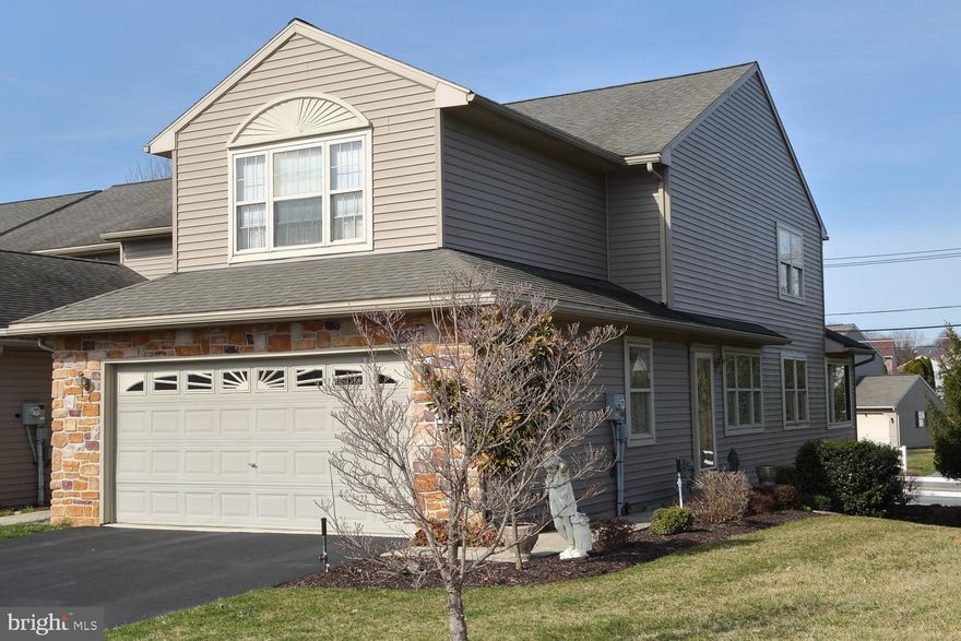 It's immediately evident this home has been loved and pampered. From the gleaming hardwood floors on the first floor (Sunroom is ceramic tile) and custom double crown molding that carries to the 2nd floor, to the professionally finished Lower level Family room with half bath, you'll see quality and care. The eat in Kitchen has newer stainless appliances, custom tiled backsplash and quartz countertop. Economical gas heat, hot water, cooking and dryer hookup.  Plush wall to wall carpet in the LL Family room is cozy and comfortable. FR opens onto oversized partially covered Patio complete with custom sunshades. Large landing on the 2nd floor makes moving a breeze. Huge Master Bedroom on 2nd floor will accommodate the largest furniture, and the en suite Bath was recently remodeled with a double step in shower.  Vaulted ceiling with fan, and wall to wall carpet finishes this room.  New gas furnace was recently installed along with hot water heater. Neutral color palette throughout. Country feel yet easy access to Rt 30 and Rt 283.  Walk into this lovely home and you'll never want to leave!