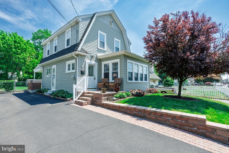 Welcome home to this delightful Dutch Colonial Revival in Penndel Borough! Enter into a bright living room filled with natural light that flows seamlessly into a spacious dining room featuring elegant chair rail molding. Throughout the home, the original 1920s character shines, including oversized baseboards, original doors, and classic trim. The updated kitchen offers granite countertops, ceramic tile backsplash and flooring, recessed lighting, and extra-tall cabinetry extending to the ceiling. Upstairs, you’ll find three bedrooms and a full bath, with ceiling fans in every room and charming built-ins in one. The bathroom features a deep tub and additional storage. Practical upgrades provide peace of mind, including two-zone air conditioning, attic storage, and newer windows, doors, siding, and roof. The basement is partially waterproofed with a French drain system. Outside, the fully fenced backyard serves as a private retreat with a covered, lighted patio, attractive landscaping, and decorative river rock accents. The exterior is anchored by a newer storage shed and a pond ready to be reclaimed. The home’s distinctive gambrel roof provides striking curb appeal, complemented by a cozy front paver patio and a driveway with parking for up to four cars. Enjoy the best of borough living with a location that is truly walkable, just steps from local parks and favorite eateries, and less than a half-mile stroll to the Langhorne Train Station for a direct ride to Center City Philadelphia. With quick access to I-295 and Route 1, this home offers a seamless commute to Princeton and NYC. Move right in or bring your own vision to life over time!