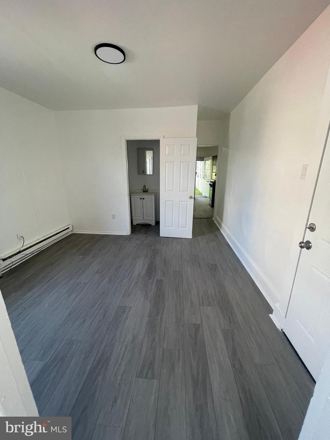Now leasing! This well-maintained brick duplex features two spacious 1-bedroom, 1-bath units with private entrances and separate utilities. Each unit has a bright living area, hardwood or tile floors, and a practical layout ideal for individuals or couples. Located near Widener University, public transit, and major highways, it's perfect for students or commuters.