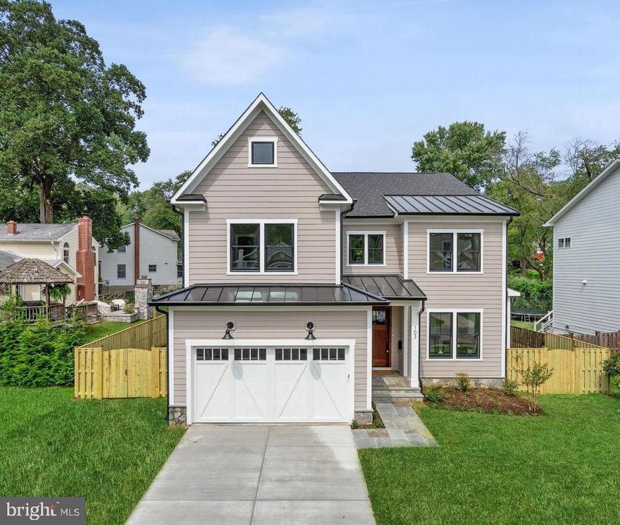 Have you ever dreamed of building a custom home, but don't know where to begin?  This home is the answer.  Jefferson Homes has been building truly custom homes in Vienna for over 20 years.  Sparing no expense, our interior designer has chosen every light fixture and faucet to create a seamless one of a kind masterpiece.   A mix of Hardie-Plank siding, stone and black-framed Anderson windows provide a transitional feel with a charming front porch.  Interior finishes are modern with a nod to rustic: natural oak hard wood floors, Jenn Air appliance package, clean cabinetry, quartz countertops, tasteful light fixtures and timeless tile selections.  See the interior design boards in photos.  Main level features great living and entertaining spaces.  Gourmet kitchen with sunny breakfast room. Large family room with gas fireplace leads to spacious covered porch.  Elegant dining room.  Flex space can be used for office or en suite bedroom.  Primary suite with tray ceiling and gorgeous bath, three en suite bedrooms and laundry room on upper level.  Rec room, game room, fully loaded wet bar, exercise room, bedroom with full bath on lower level. Jefferson Homes is known for attention to detail and high quality building materials. Enjoy the pride of ownership and confidence knowing that your new home was built by an experienced and respected custom builder.  This amazing location is walkable to town of Vienna and close to all major commuting routes. Vienna Elementary School / Thoreau Middle School / Madison High School.