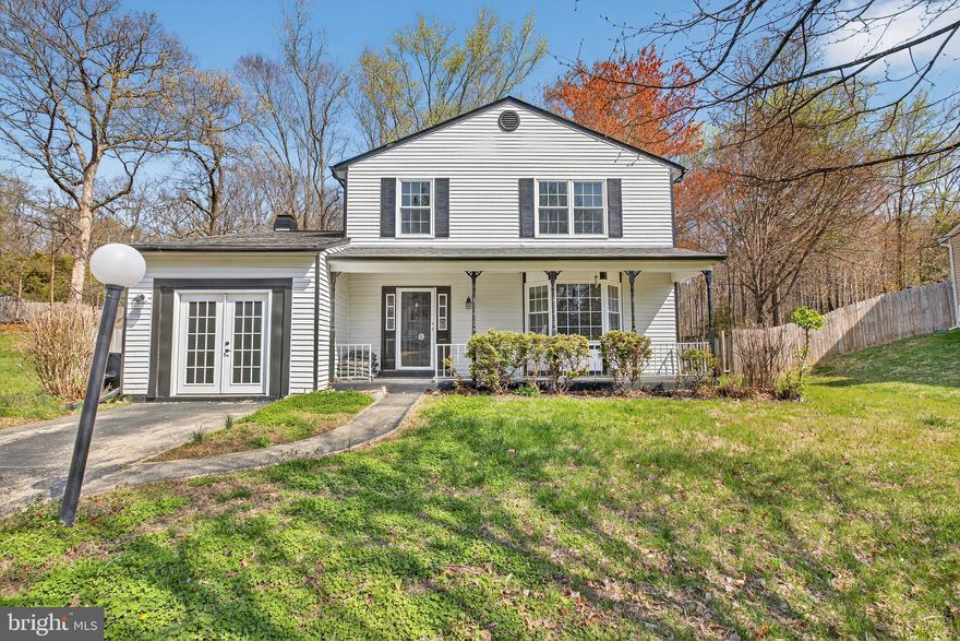 Updated colonial with finished basement, fenced yard, and functional layout. 
This 3-bedroom, 3.5-bath home offers generous living space, practical updates, and a layout designed for everyday living. A curved walkway leads to the covered front porch. 
Inside, the main level features hardwood flooring and a bright formal living room with large windows overlooking the expansive backyard. The dining area connects seamlessly to the kitchen and family room.
The kitchen has been upgraded with granite countertops, stainless steel appliances, and ample cabinet space, with views of the fenced backyard. Positioned between the dining and family rooms, the layout keeps the living areas connected. The family room features a wood-burning fireplace and access to a flexible space that can serve as a recreation room, office, or additional sitting area. There’s also a powder room and a linen closet on this level. 
Upstairs, the bedrooms are spacious, including a primary suite with generous closet space. The finished full basement is ideal for entertainment, hobbies, or a home gym. The laundry with a gas dryer, utility areas, and a sump pump are on the lower level, as well. The attic space and a backyard shed provide even more storage options.
Outdoor living includes a fully fenced backyard with a deck and open lawn. The home also features 2-car parking and a driveway for added convenience.
Located near Commo Road and Frank Tippett Road, the property offers easy access to Route 301 (Crain Highway) for commuting. Nearby Cheltenham Wetlands Park, local walking paths, and green spaces create opportunities for outdoor recreation, while shopping, dining, and everyday conveniences are just minutes away. 
This home offers space, functionality, and a convenient location with room to personalize.

Some images may reflect virtual staging or digital editing, including removal of personal property, to help showcase the home.