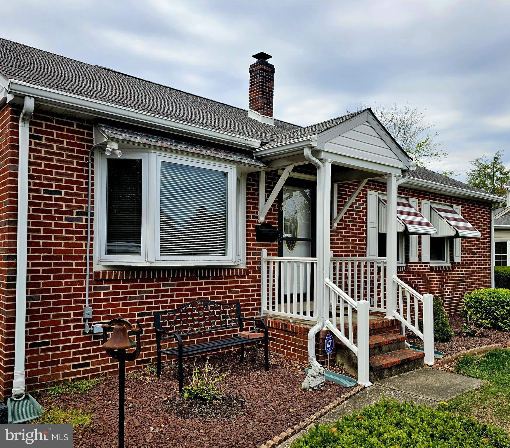 Welcome Home to this adorable Rambler/Ranch located in the original historical subdivision locally known as "The Heights". This 3 bedroom 2 full bath ALL brick home has been lovingly maintained by its owners for the last 30 years. The .409/acreage is a combination of lot numbers 2 & 3. A beautiful sunroom and extended rear porch has been added over the years. A huge 26' x 23' garage can easily accomodate 2 vehicles PLUS an additional 19' x 9' storage unit across the back of the garage for all your lawn equipment. The basement is partially finished with a french drain and sump pump installed where the laundry facilities can easily be returned to open up the Sunroom on the main floor. The other half of the basement is currently used for storage. The property has been wired for a generator if you ever happen to lose power due to heavy storms. They just don't build houses like this anymore. The main floor is all hardwood flooring, with some currently under vinyl. The location is conveniently located within town limits that includes public water, sewer and refuse but far enough out to enjoy neighborhood living.