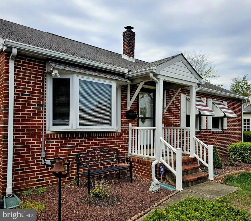 Welcome Home to this adorable Rambler/Ranch located in the original historical subdivision locally known as "The Heights".  This 3 bedroom 2 full bath ALL brick home has been lovingly maintained by its owners for the last 30 years.  The .409/acreage is a combination of lot numbers 2 & 3.  A beautiful sunroom and extended rear porch has been added over the years.   A huge 26' x 23' garage can easily accomodate 2 vehicles PLUS an additional 19' x 9' storage unit across the back of the garage for all your lawn equipment.  The basement is partially finished with a french drain and sump pump installed where the laundry facilities can easily be returned to open up the Sunroom on the main floor.  The other half of the basement is currently used for storage.  The property has been wired for a generator if you ever happen to lose power due to heavy storms.  They just don't build houses like this anymore.  The main floor is all hardwood flooring, with some currently under vinyl.   The location is conveniently located within town limits that includes public water, sewer and refuse but far enough out to enjoy neighborhood living.