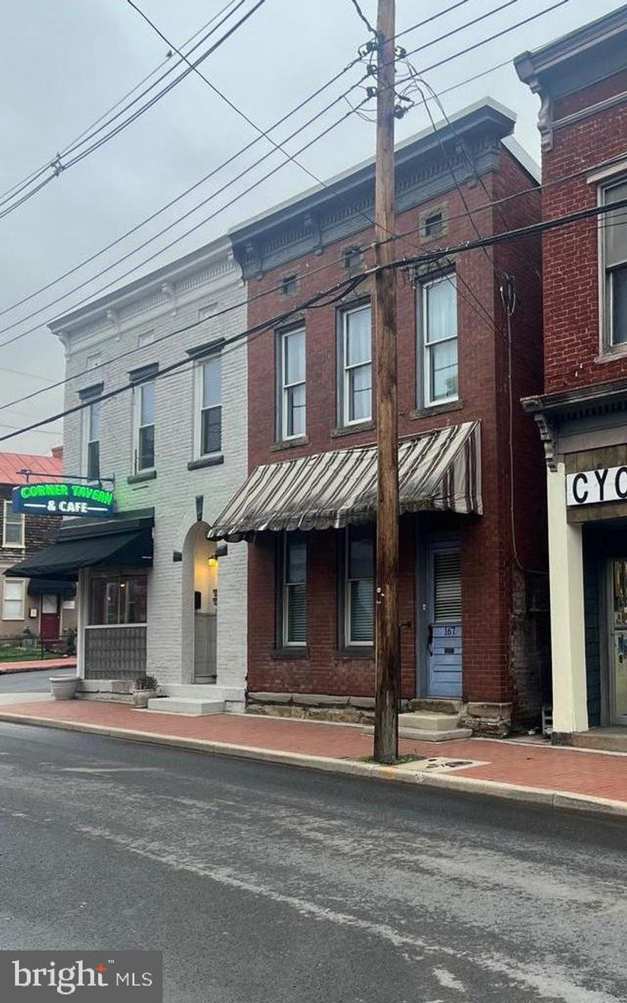 Prime mixed-use investment opportunity in Downtown Cumberland! This property features a space on the main level that could  be used a retail or rental unit,  plus an additional residential apartment unit above, offering multiple income streams. Ideal for investors or short-term rental opportunities. High-visibility location along N Centre Street, close to shopping, dining, and local attractions. Strong potential for rental income, Airbnb, or live/work use. Don’t miss this versatile property in a high-demand area!