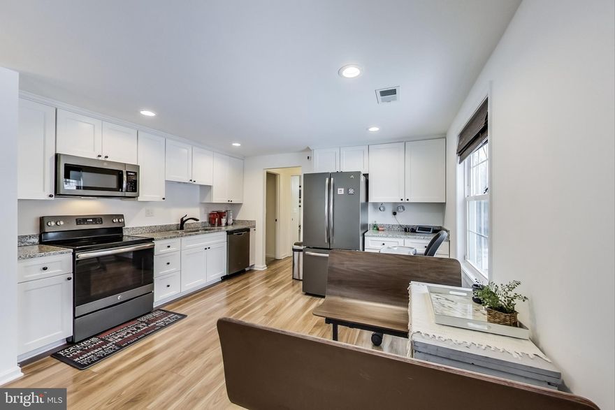 OFFER DEADLINE 3/8 at 12 noon. Thank you.  Completely renovated in 2018, 2419 York Court is a modern-design, single-level home with a beautiful open concept laying out 3 large bedrooms and 2 completely updated full bathrooms.   The front living space floor-plan is laid with wood laminate and flows into a contemporary kitchen design with recessed lighting fixtures, updated high-end stainless steel appliances, and granite countertops. The 3-bedroom layout includes a master suite with a large walk-in closet and an additional closed-off, walk-in laundry-room space with large shelving and GE SMART Washer and Dryer.   The backyard of the home is a very large open space with room for creating an extended patio, placing an outdoor shed, etc. The community bike and walking trail is nearby allowing access to the community's event center, park, and pool --- all within walking distance.   Convenient commute.  All new per 2018 Renovation:  Roof, Gutters, Windows, Shutters, Siding, Hardware, Kitchen granite, GE appliances throughout, Cabinets, Floors, Baths, Vanities, Plumbing fixtures, Light fixtures, Hot water heater, Ceiling fans, Carpet, Paint done and wood laminate floors installed during the renovation.