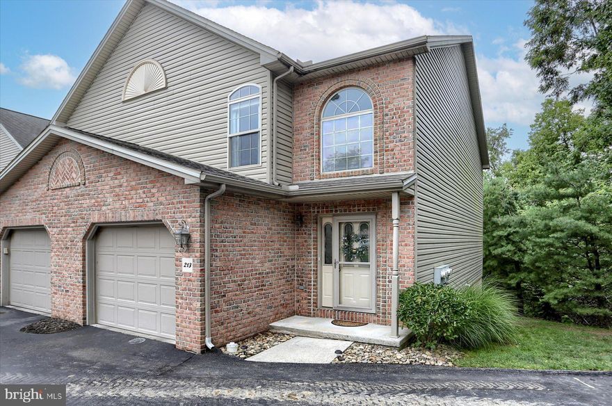 Exquisite end unit townhouse with modern updates throughout. Stunning hardwood floors on 1st and 2nd levels. Open living room with efficient gas fireplace. Bright kitchen with granite counters, tile floor & tile backsplash. Large master bedroom with luxurious tile bathroom and jacuzzi tub. Convenient 2nd floor laundry. Huge fully finished walk-out basement with storage, full bathroom, and wet bar. Large composite deck and concrete patio overlooking a secluded backyard. One car garage and plenty of off-street parking. Worry-free living with the HOA maintaining the exterior, lawn care, and snow removal. Don't miss out on this beautiful home!  Please remove your shoes when entering the house, thank you!
