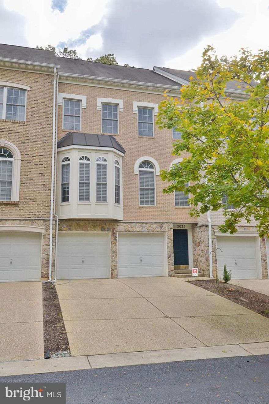 Sparkling and spacious Townhome close to Pike and Rose and Metro.  Sunny and private, this beauty features 2 car garage, hardwoods through the main level, large deck backing to woods.  Large eat in kitchen with island and gas Fireplace. Elegant dining room, and stylish living room.  Lower level rec area with separate study/office. Large Master Suite with walk-in closets.