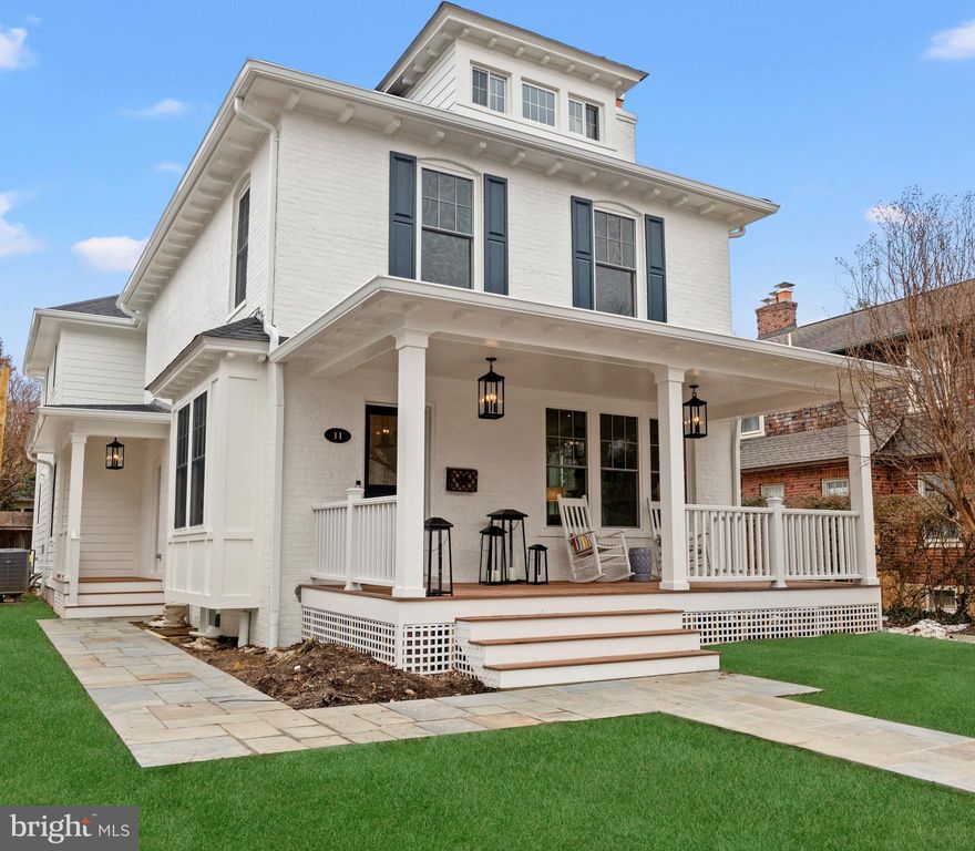 A redefined and reimagined contemporary colonial by Bluestone Builders, beautifully sited on a tree-lined street in the heart of Rosemont, just a half block from the King Street Metro and moments from Old Town Alexandria. This exceptional full renovation and expansion blends timeless architectural charm with modern luxury and an expansive, thoughtfully designed floor plan.
A gracious covered front porch and massive entry foyer set the tone for interiors filled with character, understated elegance, and custom finishes throughout. The home offers 3.5 finished levels with 5 bedrooms, 5 full baths, and 2 half baths, complemented by 9-foot ceilings on three levels, customized closets, and refined lighting design.
The main level is ideal for both everyday living and entertaining, featuring a living room with relined wood-burning fireplace, a gracious formal dining room, and a light-filled family room with gas fireplace and French sliders opening to a fenced backyard with bluestone patio. The chef’s kitchen showcases countless cabinets, under-cabinet lighting, marble countertops and backsplash, and an oversized 9’ island with honed black granite, offering abundant storage and seating. A convenient side porch leads to a tiled mudroom with bench seating, built-ins, and a powder room.
Upstairs, the primary suite is a true retreat with a luxurious bath and two customized walk-in closets. This level also includes three additional bedrooms with custom closets, two full baths, and a dedicated laundry room with utility sink. The bonus finished third floor loft features natural cherry floors, a skylight, built-in bench seating, niches, and a half bath—perfect as a playroom, studio, or home office.
An open rear staircase leads to the fully finished lower level, offering exceptional flexibility with a private bedroom suite and full bath ideal for guests, nanny, or in-law use, a recreation room perfect for games or movie nights, a dedicated exercise room with rubber flooring and full bath, a second laundry room, and an additional large storage room with custom shelving. The main and upper level have wide plank white oak floors with oversized baseboard.
The 6,500-square-foot lot provides ample off-street parking, covered front and side porches, and outdoor spaces designed for both relaxation and entertaining. Located in the shadow of the Masonic Temple, the home is a stone’s throw to METRO, Old Town, Del Ray, North Old Town, and offers easy access to National Airport, Crystal City, and Washington, D.C., along with proximity to both private and public schools.
This is a rare opportunity to own a masterfully crafted residence that delivers historic charm, modern comfort, and an unbeatable Alexandria location. ( Landscaping in progress)