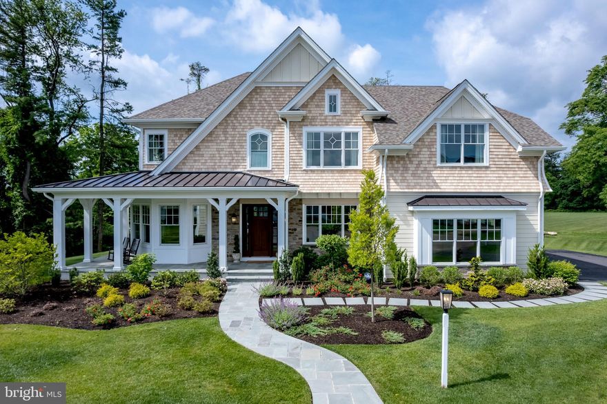 ***AVAILABLE IMMEDIATELY*** Bentley Homes CHANDLER MODEL HOME - WALKABLE TO WAYNE in T/E School District.  Quick Delivery possible for this Architectural Masterpiece & Designer Showcase Home close to KOP with easy access to Philadelphia by train or by car. The Chandler’s timeless exterior architectural details are perfectly suited to its location at the end of the cul-de-sac on a premium lot perched high overlooking the fields and pastures of Valley Forge Military Academy offering views, privacy and space for a future pool. With 6,765 sq ft of finished space this 5 Bedroom 4 full and 2 Half bath home offers all you could want in terms of comfort and space to suit your personal and entertainment needs.  Formal rooms and open spaces offer an easy flow conducive to today’s lifestyle.   A partial list of features includes FIRST FLOOR: 10’ Ceilings, Front/Rear Staircases to 2nd level and to finished Lower Level; Office/Library with custom trim, bay windows,  and glass French door for privacy; Formal Dining Room and Formal Powder Room both with wainscoting and designer wallpaper;  Great Room with coffered ceilings, nickel gap trim, custom built-ins with extra seating flanking the gas fireplace and direct access to the rear blue stone patio;  Designer Kitchen with 10’ x 5’ Island with farmhouse sink, counter seating, Sub-Zero, Wolf and Bosch Appliances, custom in cabinet and under cabinet lighting; Breakfast Room overlooking the patio that opens to the rear Screened Porch, Butler’s Pantry with nicely appointed Bar area revealed behind 8’ barn doors; Mudroom area between kitchen and garage includes a Catering Kitchen w/dishwasher and designer tile, quartz  and cabinetry upgrades, Pantry with upgraded storage system, built-in cubbies, casual Powder Room  and ample closet space, SECOND FLOOR: Primary Bedroom Suite that spans the entire rear of the home with coffee bar, fireplace with custom millwork and picture frame TV,  2 W-i-Cs with windows and linen upgraded closet system, Spa Bath Retreat with marble tile, dual vanities, makeup counter, 5 x 8  shower with shower heads on both sides, central rain head and shower wand, floating quartz bench, frameless glass shower door, designer mirrors & lighting,  and spacious linen closet. A lounge area with Built-in desk and nickel gap accent wall;  3 Bedrooms – one with ensuite Bedroom and 2 with a shared bath – all with W-I-Cs, Designer wallpaper and customized finishes; Hall linen closet,  2nd floor Laundry Room w/quartz countertops and extra storage that is accessible to both the Primary BR Suite and the Secondary BR’s for added convenience; LOWER LEVEL: Daylight windows with gorgeous stone window wells, 5th Bedroom, Full Hall Bathroom, Recreation Room, Game Room, Exercise Room Bar area with 2 level – bar height counter seating with waterfall quartz top, sink, bar fridge, & d/w.   Other features include Designer paint, wallpaper, and window treatments; Millwork including crown molding, wainscoting, nickel gap walls and ceiling treatments in select areas, solid core doors with black hardware, and built-ins; Integrated Audiovisual system in several areas, security system, exterior sprinkler system and many more.  EXTERIOR: Hardie Plank and Cedar Impressions siding, Asphalt & Metal roofing, Pella Windows, 8’ front entry door with sidelights, wraparound porch, rear patio and side covered entry - all topped with bluestone, rear screened in porch, bluestone walkways, automatic lawn sprinkler system PLEASE NOTE: Photos are of the home for sale - home being sold unfurnished. Inclusions and exclusions are separately noted in the listing.