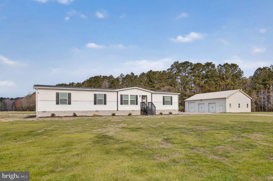 Nearly new 2024 4BR, 2BA home set on a large private lot, offering modern living with an exceptional detached shop—perfect for car enthusiasts, small business owners, or anyone seeking a home with workshop/garage space. This open-concept layout features a spacious living room, expansive dining area, and a beautifully designed kitchen with center island, stainless steel appliances, and abundant cabinetry. Durable luxury vinyl plank (LVP) flooring runs throughout the main living areas for style and easy maintenance.

The split-bedroom floor plan provides privacy, highlighted by a generous primary suite with double vanity and soaking tub, creating a spa-like retreat. Three additional bedrooms offer flexibility for guests, home office, or hobby space.

The standout feature is the impressive 64’ x 40’ (2,560 sq ft) detached 3-bay garage/shop—ideal for automotive work, contractor use, or a home-based business. Equipped with two 10,000 lb Magnum 2-post lifts, two 10’x10’ doors, one 12’x12’ door, and an interior wash bay with French drain, this is a rare opportunity for buyers searching for a large shop, mechanic’s garage, or workspace property.

Enjoy the expansive lot with room for an ADU, RV/boat parking, equipment storage, gardening,  or future expansion. 

If you’ve been searching for a newer home with land, large detached garage, workshop property, or live/work setup, this property delivers space, functionality, and versatility.