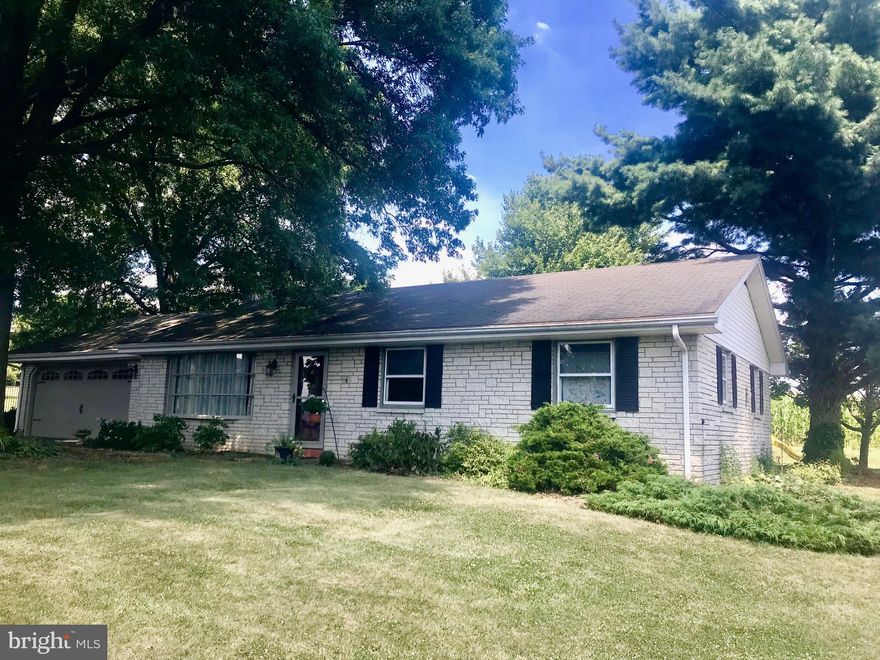 Quaint Ranch style home close to school, doctors, restaurants, grocery stores, etc.  Home has newly remodeled kitchen which leads to 3-Season room.  Home offers some new flooring and beautiful yard.  Price to sell quickly.