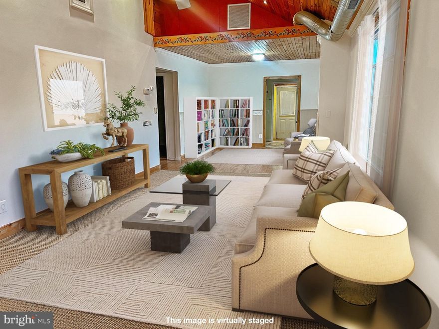 Recent upgrades include brand-new siding (2024) and dual HVAC systems (2022), ensuring comfort and efficiency throughout. Price reflects condition.  Seller offering 2.5% concession 

The finished lower level offers a separate entrance, full kitchen, full bath, and dedicated HVAC—creating potential for guests, multi-generational living, or income opportunity.

Outside, enjoy privacy with a flat backyard, plus two detached garages accommodating multiple vehicles with extra storage. The deep driveway provides additional parking convenience.

Prime location just minutes from the 695 Beltway and minutes to Foundry Row’s dining and shopping. No HOA.