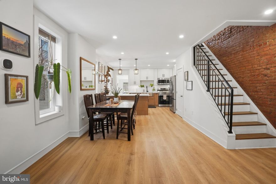 Fully renovated twin in West Conshohocken, rebuilt from the exterior brick in! New insulation, drywall, and systems throughout. A covered front porch leads into a modern, open-concept first floor with warm LVP flooring, recessed lighting, and a brick accent wall.

The kitchen features two-toned shaker cabinetry, stainless steel appliances, a farmhouse sink, white tile backsplash, and a large peninsula with statement lighting. Just off the kitchen, a mudroom with built-ins, laundry, and a powder room adds convenience, with direct access to a spacious, maintenance-free deck overlooking a fully fenced yard.

The second floor offers two well-sized bedrooms, including a primary suite with a private ensuite bath, plus an additional full hall bathroom. The third floor provides a private retreat with a third bedroom, walk-in closet, exposed brick, and another full bath, ideal for guests or a home office.

The finished lower level adds flexible living space with a large rec area (or a 4th bedroom), full bathroom, additional laundry hookups, storage, and walkout access to the backyard.

Prime location just minutes from Fayette Street’s restaurants, cafés, and nightlife, with quick access to major routes and SEPTA Regional Rail for an easy commute. Walkable setting with ample street parking, including both resident and nearby public options.