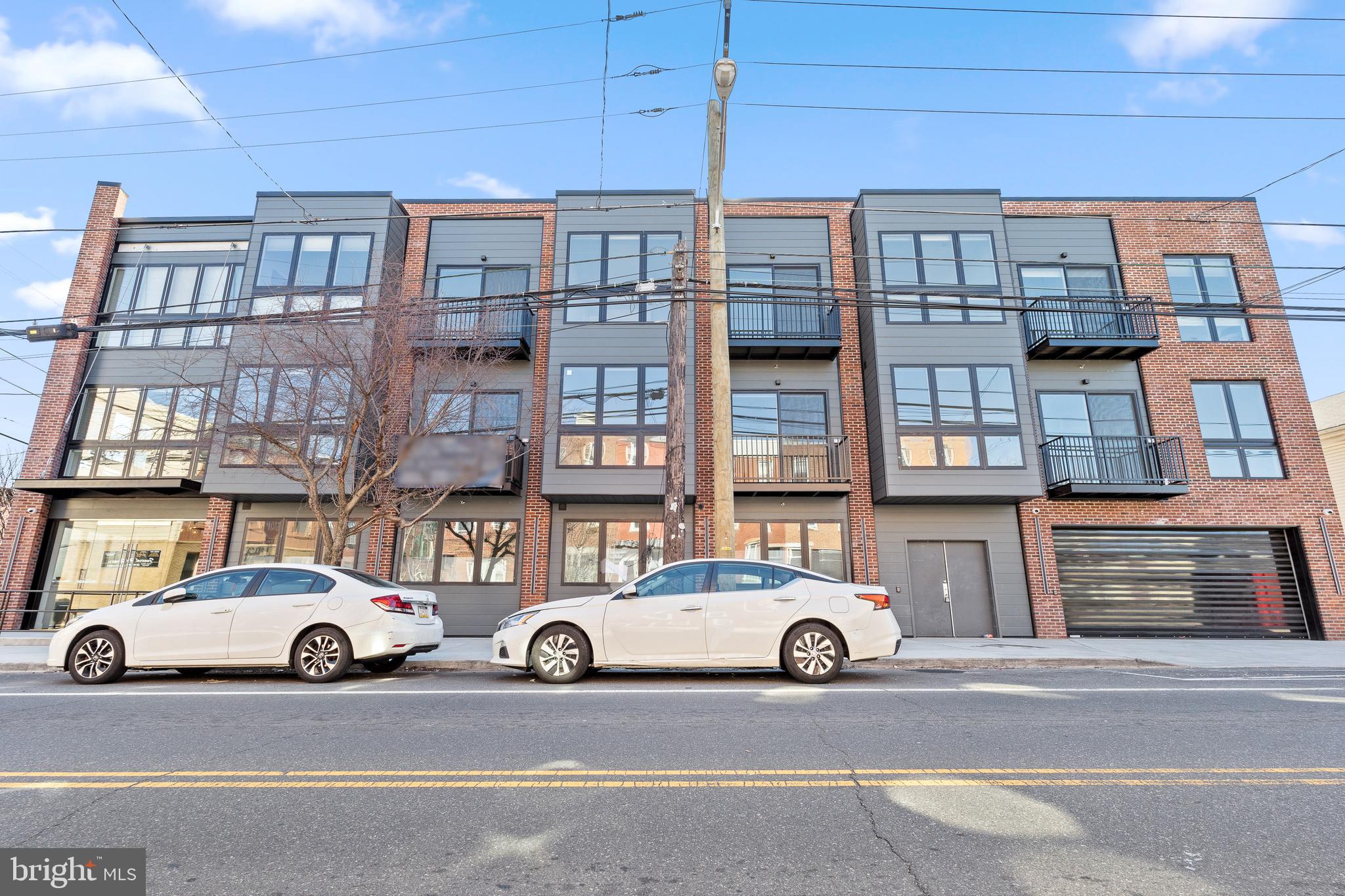 BRAND NEW LUXURY living in the heart of Queen Village! Enjoy the best of modern living in one of Philadelphia's most desirable neighborhoods at 300 Christian.
Each airy and light-filled unit is thoughtfully laid out. As you enter, you're welcomed with floor to ceiling windows, high ceilings, in-unit stacked GE washer and dryer, great closet space, and high-end flooring throughout. The open concept living and dining room is perfect for entertaining. In the kitchen you'll find soft-close cabinets with a gleaming white finish, GE and Haier stainless steel appliances, dishwasher, plus gorgeous Dolomite Marble countertops.
Off of the living space you'll find a comfortably-sized bedroom that offers ample storage and natural light, creating an inviting retreat. The bathroom continues with the same bright, fresh and clean aesthetic, featuring instant hot water and a roomy shower and tub for relaxing. Some units even feature an extra bathroom and extra closets, so act now to take your pick before all of these fabulous units get snapped up!
This handsome pet-friendly building features a fitness center, secure mail room, onsite garage parking, bicycle parking, flex space, additional storage, elevator, communal roof deck with breathtaking city and garden views, with some private balconies and patios available. All of these amenities combined with a great location make the residence at 300 Christian a wonderful place to call home.
Enjoy being steps away from neighborhood favorites like Philadelphia Java Company, Shot Tower Coffee, Fitz on Fourth, Practice Yoga, Weccacoe Playground and Tennis Courts, Mario Lanza Park and Dog Run, easy access to I-95, public transportation, the expansive Delaware River Trail, and more. Welcome home!
*Photos are of a model unit. Each unit has similar finishes.