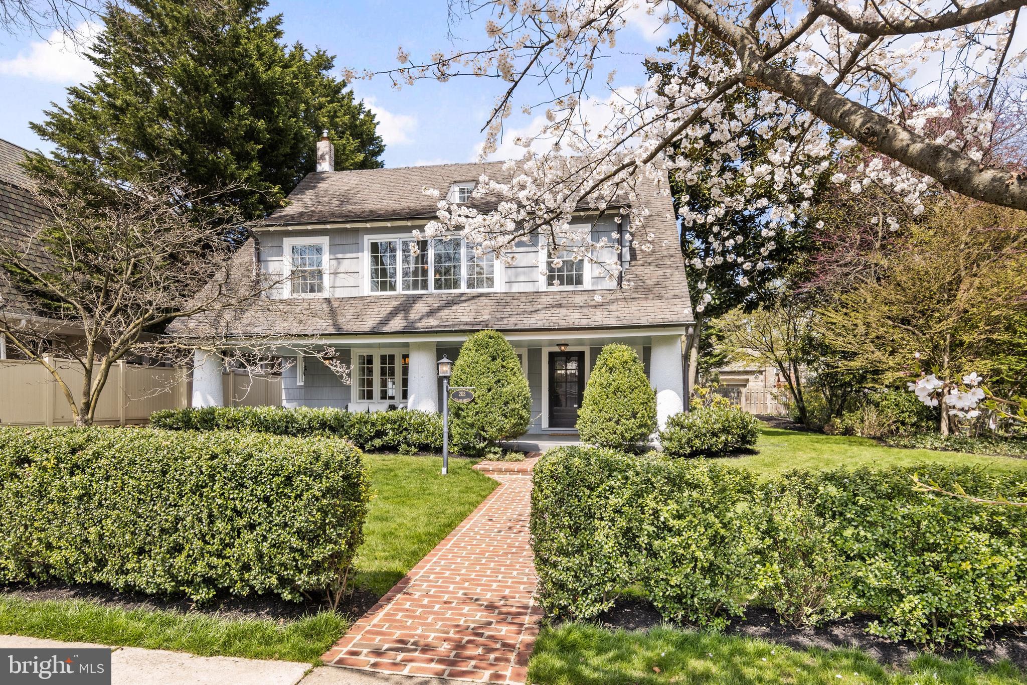 Charm abounds at this special Walk-To Wayne home in the coveted South Wayne neighborhood. You approach the home from the tree-line, sidewalks of the bucolic South Wayne neighborhood to find an inviting covered porch. The first floor boast hardwood flooring and a comfortable flow from the large living room with gas fireplace and French Doors to the spacious flat rear yard and large flagstone patio. To the left of the door find a spacious Dining Room that flows to powder room and the Butler's Pantry/Coffee nock and to the beautiful remodeled kitchen with white cabinetry, stainless appliances and Carrara marble countertops. There is an island for prep work and a cozy eat-in dining area. A rear door gives access to the oversized driveway and the oversized detached two-car garage. The second floor has an amazing large Master Bedroom/Bathroom suite with beautiful remodeled bathroom, with large shower with body jets, and steam shower, all done in Carrara marble finishes. There is a large walk-in closet in the bathroom area and two additional smaller closets in the bedroom. This floor has two other bedrooms of really nice sizes and a hall bathroom with timeless finishes. The third floor offers additional flex space to use as a fourth bedroom, guest bedroom, office, workout area. A third full bathroom completes this floor. The lower level is excellent for storage and utilities. This home is PORCHFEST perfect!! Please see PDFs in the documents section for information about PORCHFEST or go to SouthWaynePorchFest dot com for more information. South Wayne is a very social place to live. You are going to love it here.