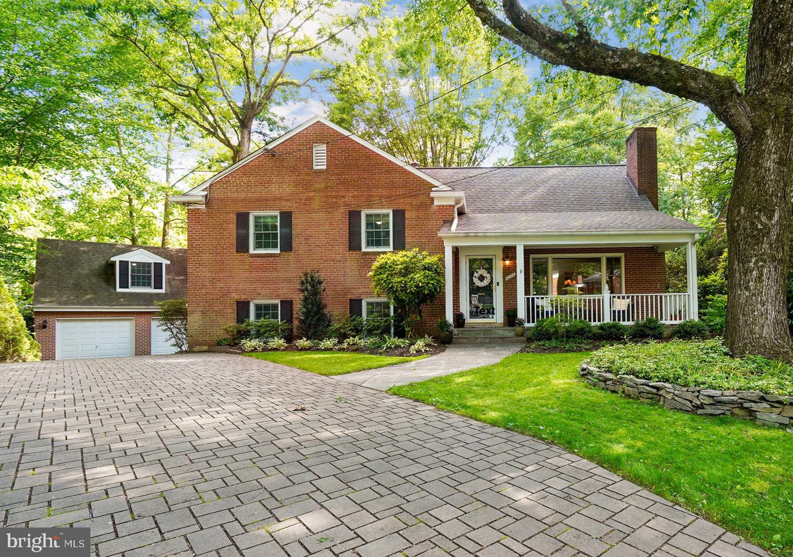 MUST SEE DECEIVING EXPANSIVE INTERIOR! Wood Acres/Pyle/Whitman school district! Nestled on a quiet cul-de-sac in desirable Woodburn/Bannockburn. Beautifully expanded 4-level split features 5 bedrooms and 5 bathrooms on a sprawling 13,952 SF lot. Main level offers a formal living room with fireplace, oversized dining room with custom built-ins and serving area, gourmet eat-in kitchen with stainless steel appliances and double pantry opening to a spacious family room with wood-burning fireplace, and a powder room. Enjoy the seamless flow to multiple outdoor living spaces, including an upper deck, screened-in porch, lower deck and a relaxing patio with hot tub. The 2 upper levels feature 5 bedrooms - a fabulous owner's suite with en suite bath, spacious closets and a wood-burning fireplace, a 2nd primary bedroom with en suite bath, three additional bedrooms and a full bathroom. Spacious lower level features a family room with built-ins, large laundry room, storage room and a powder room. Detached oversized 2-car garage with a second-floor bonus room, perfect for remote work or hobbies. Loads of storage and a GENERAC generator make this home a MUST SEE! Convenient to downtown Bethesda, Crescent Trail, Westbard Square, multiple airports and DC. And don't miss the walking path just steps away to Merrimac Park. Schedule your showing today!
