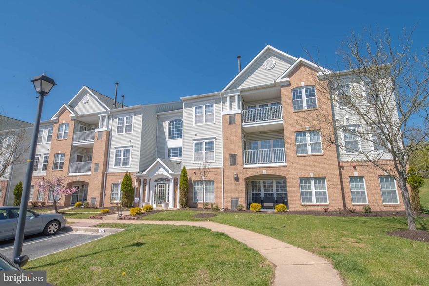 Nestled in the charming Devonshire at White Marsh community, Conveniently located close to commuter routes: US-1, I-95, and I-695 for easy access to downtown Baltimore. Easy commute to Target, Merritt Athletic Club, Best Buy and other favorite amenities. This inviting garden-style unit offers elevator access and a perfect blend of  other comforts and conveniences. Spanning 1,334 square feet, the well-designed layout features plush carpeting and durable vinyl flooring, creating a warm atmosphere throughout. Step inside to discover a spacious primary bath, complete with a tub shower for relaxation after a long day. The thoughtfully designed kitchen boasts modern appliances, including a built-in microwave, gas oven/range, dishwasher, and refrigerator, making meal prep a delight. A convenient pantry provides ample storage for all your culinary needs. Enjoy the ease of in-unit laundry with both a washer and dryer, ensuring your daily routines are hassle-free. The unit is equipped with ceiling fans and an intercom system for added comfort and security. Outside, the community offers beautifully maintained common grounds, complete with sidewalks and street lights, perfect for evening strolls. With an association that covers lawn care, snow removal, and trash services, you can spend more time enjoying your home and less time on upkeep. Parking is a breeze with designated spaces available in the lot. This unit is not just a place to live; it’s a place to thrive.