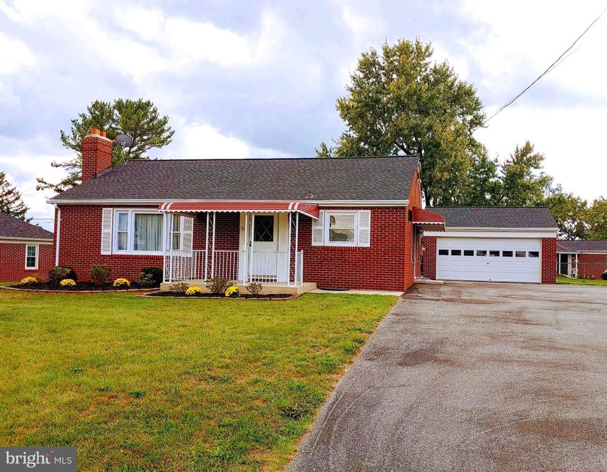 Don't miss this well maintained all brick, two-bedroom, two full bath Rancher with a detached two car garage, and an additional shed. The front and side entrances with matching aluminum awnings give this gem of a home great curb appeal. The covered front porch is a great place to enjoy your favorite beverage or just relax and read a book. The spacious eat in kitchen has all new Stainless appliances, and a pantry for your food storage.  The home's living room has a wood burning fireplace and plenty of natural light. It has the original hardwood flooring under the carpeting on the main level. The Laundry room is also located on the main level for convenience. The lower lever features a large rec room, a second kitchen, a full bath, and a bonus room to use as an office or den.  The home has central air and oil heat. Roof replaced in 2022. Second driveway on left belongs to the property. Shed included AS-IS. Main level living at its best located close to all that Westminster has to offer. Don't wait to see this move in ready single-family home, only needing its new owners.