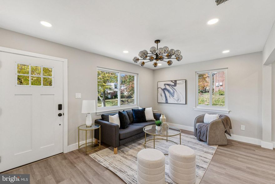 Welcome to this delightful 4-bedroom, 3-bathroom brick home nestled in the heart of Silver Spring's sought-after McKenney Hills neighborhood...This 1,980-square-foot residence seamlessly blends classic charm with modern conveniences... Step into a bright and airy living room that offers a warm and welcoming atmosphere, perfect for both relaxation and entertaining... en-concept living area. Features include recessed lighting, fresh paint, and new flooring throughout... The kitchen showcases unique pendant lighting, new stainless steel appliances, quartz countertops, and plenty of cabinetry... Four generously sized bedrooms offer peaceful retreats, complemented by a bathroom on each level... The finished basement invites you into an additional living space... The property boasts a spacious yard, ideal for gardening, play, or outdoor gatherings... Located just 0.4 miles from the Forest Glen Metro Station, commuting is a breeze... Enjoy proximity to McKenney Hills Neighborhood Park, shopping centers, dining options, and top-rated Montgomery County Public Schools, including Flora M. Singer Elementary, Sligo Middle, and Albert Einstein High School... This one will not last... Schedule your showing today!