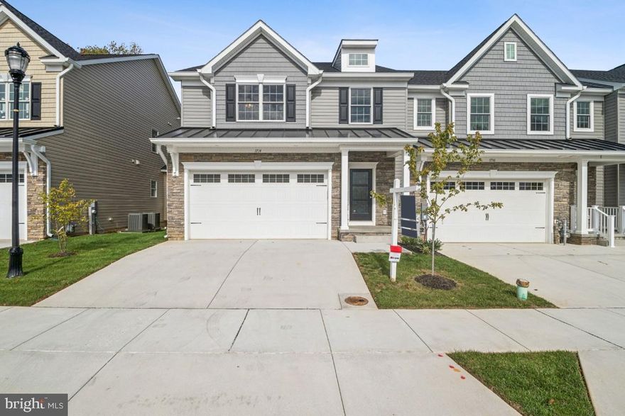 OPEN HOUSE SATURDAY 12 TO 3! See new photos and virtual tour video just uploaded! NEW 55 & Older End of Group Ready for Immediate Occupancy! Eldersburg's newest 55 & older Doroly Gardens community upscale Villas, small enclave of 28 total units when completed! Custom, Quality Built by Patton Homes, building in Carroll County for over 40 years! Builder can make modifications to the unit if necessary! Two by Six exterior construction, Andersen tilt windows & slider. Recessed Fire Sprinklers. First floor features solid 5" wide hardwood floors, Powder room with granite counters, taller soft close vanity & larger ceramic tile floor. First floor laundry room with large ceramic tile floor. Gourmet kitchen with hardwood floors, island with breakfast bar, upgraded granite counters, backsplash tile, white Shaker cabinets, soft close doors & drawers, stainless steel appliances include: gas range with oven, under counter wall oven (2 ovens total) dishwasher & microwave plus garbage disposal. pendant lighting, LED under cabinet lights & recessed lighting. Bay window table area. Great Room with hardwood floors, vaulted ceiling, gas fireplace with marble surround, celling fan, sliding door to covered rear porch. First Floor Owner's suite with hardwood floors, tray ceiling & ceiling fan, ensuite owner's luxury bath with taller double vanity, large shower, linen closet & large walk-in closet also with hardwood floors. Steps to second floor with hardwood treads, white poplar risers to loft area. The huge Loft are is great for additional TV area, studio or office with hardwood floors, ceiling fan and recessed lighting. Located off of the loft is a separate storage room.  Plus 2 additional large bedrooms, each with hardwood floors, walk-in closet & ceiling fan. Plus large hall storage closet. Plus there is a huge unfinished basement that can be completed at an additional cost if needed. There is a full bath rough-in, wet bar rough-in, a basement door exit with a couple steps up to yard plus an egress window exit too for extra light in  the basement. The HVAC is 2 zones- heat pump with natural gas back-up heat, public water & sewer. Builder offering $5,000 to closing if you use their recommended lender. 2 end units ready for quick occupancy and more units under roof. Convenient access to Routes 32 & 26. Close to shopping centers and restaurants! Open every Saturday 12 -3 pm or call agent to make an appointment to view units on other days.