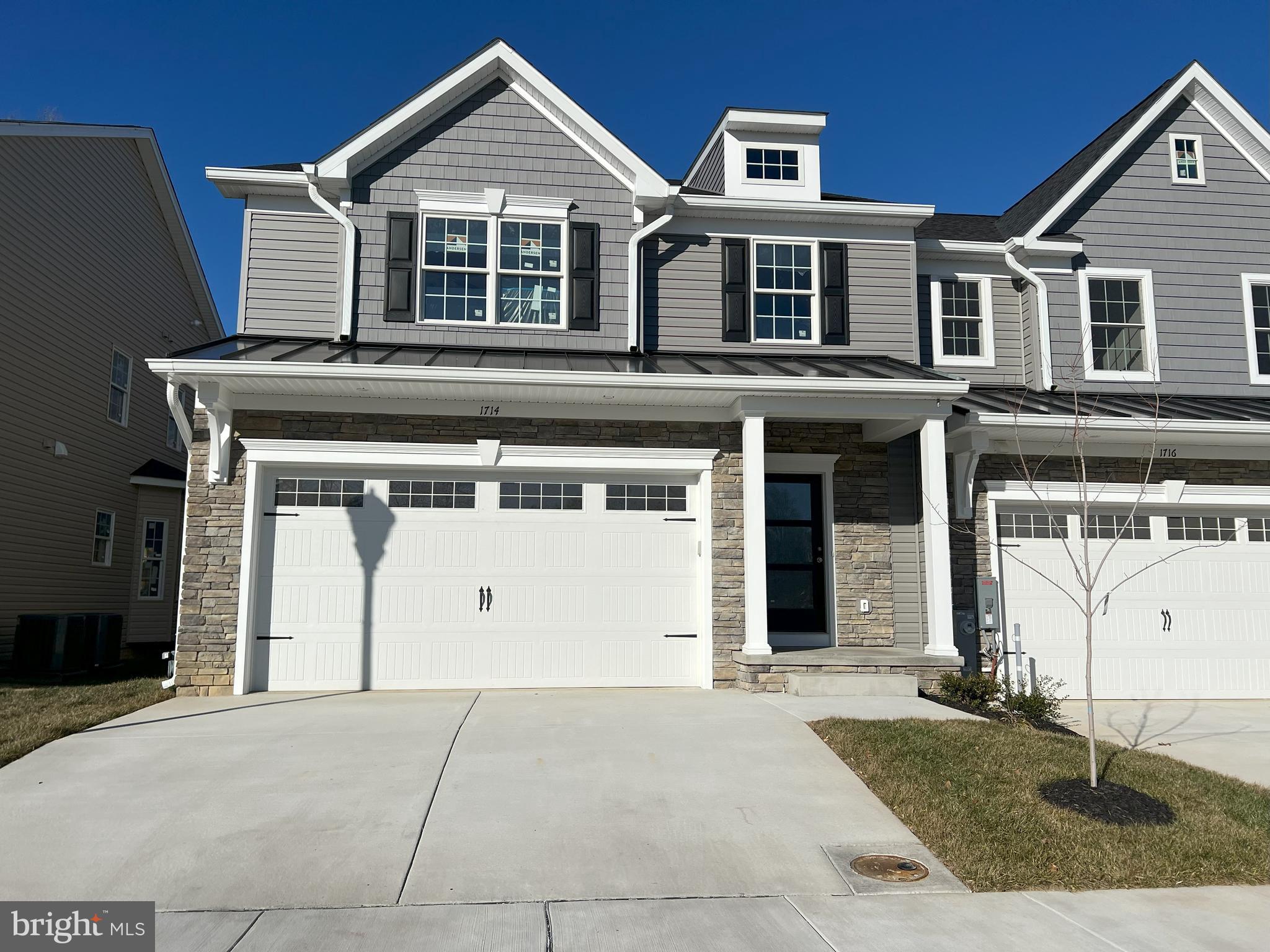 Open House On Saturday from 12-3 pm. Quick delivery End Unit just needs final touches and it’s ready to go! Call Carol to see unit. Stop by 1716 Botanical Ct and agent will give you a tour. Eldersburg's new Doroly Gardens 55 & older upscale community will have 28 units when completed. This custom home is built with quality materials inside & out, 2x6 exterior walls, recessed fire sprinklers in finished areas! Exterior features include cultured stone, vinyl siding & cedar look vinyl shake accents. Solid hardwood foors 5" wide is included in foyer, kitchen, great room, all BR's and loft area. Quality Andersen double hung tilt windows with full screens & sliding door included. The 1st floor includes a foyer with coat closet, half bath with taller vanity, granite counters, ceramic tiled floor and conveniently located first floor laundry room with ceramic floor. The spacious kitchen is open to great room and includes: island with breakfast bar, pendant lighting, soft close cabinetry w/roll out trays, trash/re-cycling drawer, granite counters, ceramic tile backsplash, under cabinet LED lights. Whirlpool stainless steel appliances include: gas range , plus a under counter wall oven (so 2 ovens!) dishwasher, microwave plus a garbage disposal. Great room with vaulted ceiling, ceiling fan, natural gas fireplace with mantle & marble surround with sliding door to covered rear porch with electric outlet & recessed lighting. First floor owners suite with hardwood floor, tray ceiling & ceiling fan, ensuite full bath with large ceramic tile floor & shower surround, taller vanities, double sinks, granite counters large shower, linen closet & walk-in closet. Take the stairs to second floor with oak stair treads with white risers & oak railings with black wrought iron balusters. Second floor includes a huge loft with hardwood floors & ceiling fan, linen closet, 2 spacious BR's with walk-in closets, ceiling fan & hardwood floors. Second floor also includes a large full bath with double vanities, granite counters, plus bathtub & commode in a separated room all with over-sized ceramic tile. Located off the loft is a large mechanical/storage room. The full basement is unfinished and includes a full bath rough-in, rough-in for wet bar, plus an egress window & single door basement exit to yard. Basement could be finished at an additional cost to Buyer. The home also includes a two car garage that is insulated, drywalled, painted with garage door opener & exterior keypad. The Trane HVAC is a two zoned heat pump with natural gas back up heat & CAC. Monthly condo fee $225 includes lawn care, trash service, road maintenance, street lights, snow removal & exterior mulching. There are 2 end units 1714 & 1712 Botanical Ct and two interior unit available for sale, 1716 & 1710 Botanical Ct. BUILDER OFFERING $5,000 TOWARDS BUYERS CLOSING COSTS WITH USE OF BUILDER RECOMMENDED LENDER ONLY, WITH FULL PRICE CONTRACT!