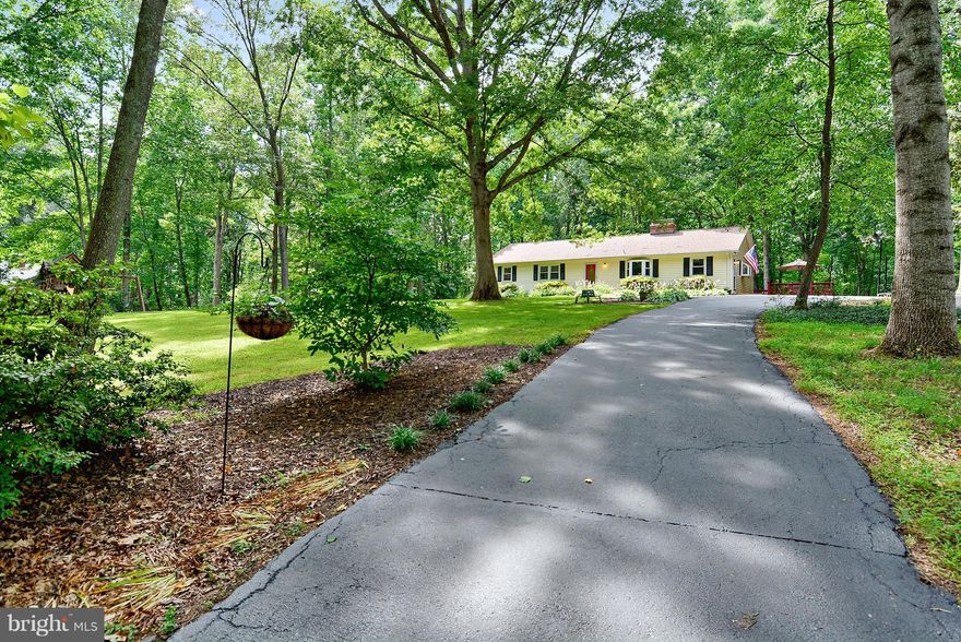 PRICED Below APPRAISAL!!!Outstanding CUSTOM Home on 1+Acre in Desirable GAILA WOODS Equestrian Community-Adjacent to TOP Ranked Coles/Benton/COLGAN Schools! Tree Framed UPDATED Country Estate features 2 Fireplaces,2 Decks,Renovated Kitchen wMaple Cabinets & Granite Counters,Owner's Suite & 2 Large Bedrooms on MAIN wGorgeous Hardwoods,HUGE Walkout Basement wGuest Suite,OFFICE & Fabulous Laundry Rm!