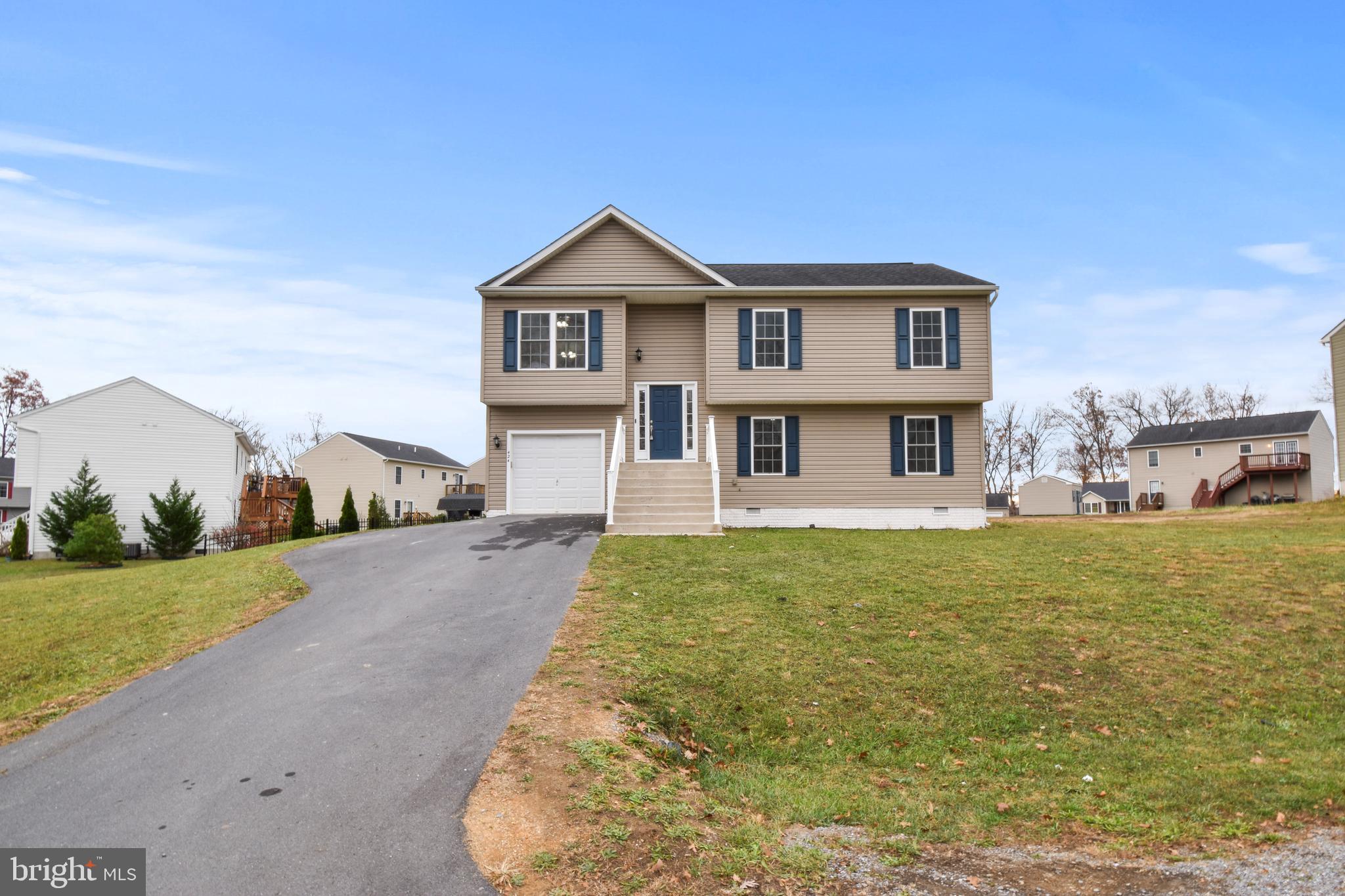 We have the Split foyer for you today..with fresh paint, appliance upgrade, lovely newer carpet, modern lighting fixtures, and turn key condition. Great level yard and a perfect starter for your next stage in life. Owner is a licensed VA agent