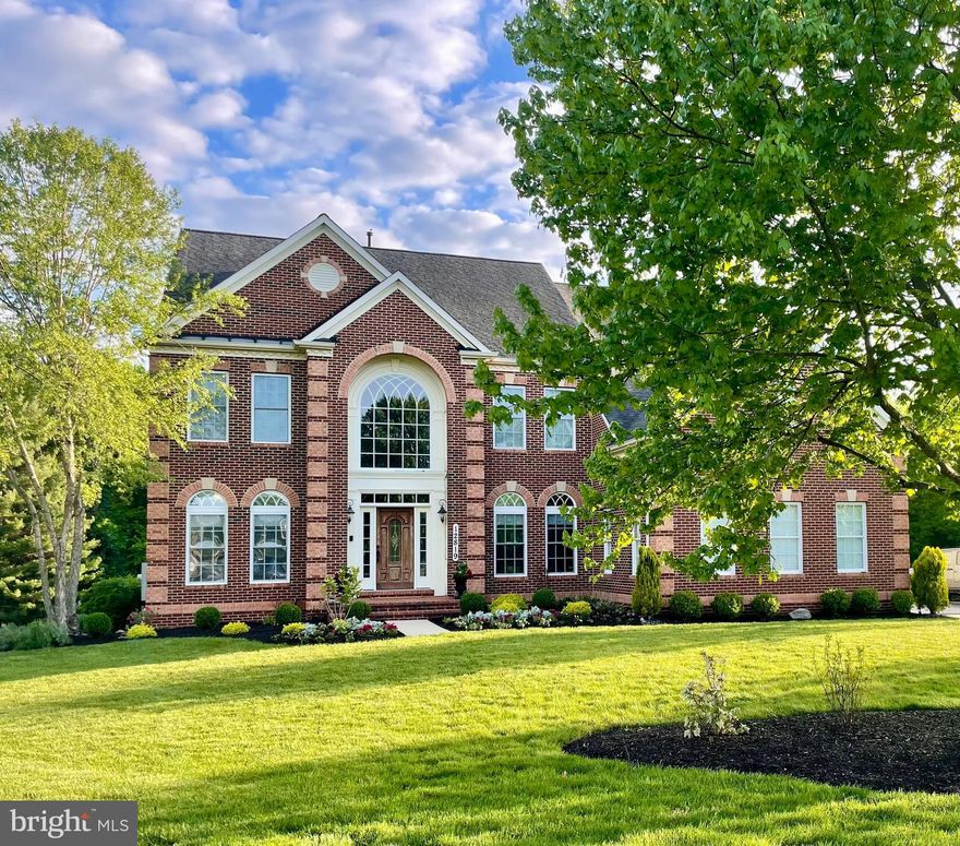 Set on a serene, wooded corner lot spanning over an acre in the sought-after Roberts Landing neighborhood, this exceptional residence offers almost 6,000 square feet of refined living space with five bedrooms and four-and-a-half baths. Fully renovated kitchen and bathrooms showcase high-quality finishes and appliances, while wide-plank hardwood floors span the first and second levels. A recently finished walk-out lower level provides expansive living space with the potential for two additional bedrooms and ample finished storage.

The large primary suite is a true retreat, featuring a spa-like primary bath and a custom-designed closet with built-in shelving. Nine-foot (or higher) ceilings enhance the home’s open, airy feel, complemented by refreshed neutral paint and custom window treatments throughout. All bedrooms feature newly replaced, high-quality carpeting and padding.

Outdoor living is equally impressive. Backed by mature woods and open space, the property features a custom slate and stone patio with slate stairs from the driveway, a leveled backyard ideal for entertaining, tents, recreation, or a future sport court, and an in-ground basketball hoop. Custom landscaping, multiple varieties of mature trees, and a low-voltage accent lighting system create a tranquil setting with stunning sunset views.

Additional highlights include wired speakers on the second and third floors as well as in the garage, a three-car garage with extended driveway, and thoughtful custom features throughout—offering privacy, elegance, and everyday functionality in a peaceful, natural setting.