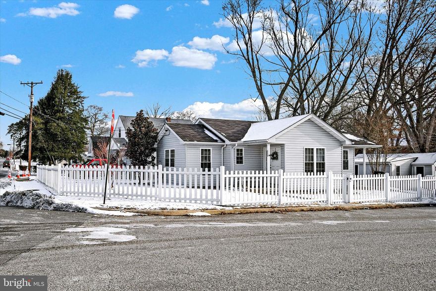 Welcome to your dream home with the white picket fence! This charming 2-bedroom, 2-bathroom ranch-style residence, built in 2012, offers a perfect blend of comfort and modern living. Nestled on a spacious 0.23-acre corner lot, this property boasts a beautifully landscaped yard, ideal for outdoor gatherings on the patio or quiet moments of relaxation. Step inside to discover an inviting open floor plan that seamlessly connects the dining area and living spaces, enhanced by stunning hardwood flooring. The well-appointed kitchen features a refrigerator, stove, dishwasher, and disposal, making meal prep a delight. Enjoy the convenience of a main-floor laundry area equipped with a washer and dryer. Retreat to the primary suite, complete with a luxurious bath and a generous walk-in closet, ensuring ample storage for all your needs.  The second spacious bedroom and hall bath provide additional room for family or guests. Outside, you'll find a shed, detached garage, and a versatile attached bonus room with separate entrance perfect for hobbies, an office, recreation or extra storage. Relax on the inviting patio or porch, where you can soak in the tranquility of your surroundings. With secure or street parking options and a well-maintained property condition, this home is ready for you to move in and make it your own. Don’t miss the opportunity to own this delightful property that perfectly balances indoor comfort with outdoor charm!