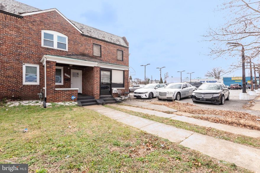 Residential or commercial use! Great location—close to everything. This very row home offers over 2000 finished sq ft on 3 spacious levels, featuring a fully renovated 3BR/2.5BA home with an open floor plan and top-of-the-line finishes. The elegant kitchen boasts Quartz countertops, LG stainless steel appliances, and 42" cabinets. Beautiful hardwood floors extend throughout. Outdoor enthusiasts will appreciate the enclosed porch and an oversized deck out back, perfect for summer BBQs. The 2-car gated, private parking pad out back helps protect your car from street parking. The fully finished lower level includes a full kitchen with Quartz countertops, stainless steel appliances, a full bath, and a walkout to a covered patio