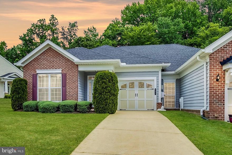 Welcome to your dream home in the heart of an active-adult community! This charming, one-level duplex offers a blend of comfort, and functionality. As you step inside, you will immediately notice the warm and inviting ambiance created by the beautiful hardwood floors that extend throughout the entire home.  Walking through the foyer and down the hall you will find the open living room with a soaring, vaulted ceiling and a cozy, electric fireplace.  The dining area is conveniently located between the living room and kitchen and offers plenty of space for a dining set, buffet and more!   Moving ahead you will find the wonderful kitchen with its Stainless appliances, abundance of counter and cabinet space and a bright breakfast area.  For additional living space, a family room is located next to the kitchen, offering a versatile area that can be transformed to suit your preferences. Whether you envision a space for your TV, an office, or a place for hobbies, this room allows you to design the perfect space!  This home boasts two generously sized bedrooms as well.  The primary suite features a tray ceiling with a fan, dual closets (1 walk-in!) and a large private bathroom!  The second bedroom is equally spacious and thoughtfully designed to accommodate guests or serve as a versatile space for your hobbies or office.  Completing this wonderful home is a one-car garage, providing secure parking and additional storage options, a rear patio that backs to the common area and trees and a beautiful yard with an in-ground irrigation system!  Beyond the walls of your new home, the active-adult community offers great amenities tailored to enhance your lifestyle. Engage in social activities or take a swim in the neighborhood’s private pool!  This home is conveniently located near plenty of shopping and dining options, as well as close to major roadways.  You can purchase this home with confidence; this home comes with a one-year First American Warranty!