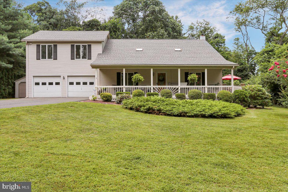 Welcome to 8 Schoolhouse Lane in Ruscombmanor Township. This Oley Schools 4 bedroom, 3.5 bath home offers 3400 plus square feet of finished living area (includes 800 SF in lower level rec room) and is tucked away on a private cul-de-sac. Long driveway leads you into the open clearing where the home sits surrounded by tree lines. Enjoy the beauty of nature from your oversized covered front porch with wrap around deck to the side with access from the dining room - a great spot for some grilling while enjoying a cold beverage. Step inside to the open concept floor plan where you'll love the vaulted ceiling living room that flows into the dining area, both with beautiful engineered hardwoods. Just beyond, you'll find the sure to please eat-at peninsula oak kitchen. Features include granite tops, tile floors and backsplash plus walk-in pantry/laundry room. Looking for no steps living? Then you'll like the main level bedroom (currently an office) and powder room that complete the main living area. Take the stairs to the owners suite with walk-in closet and stall shower/Jacuzzi tub bath. 2 additional generous sized bedrooms and a full tub/shower bath completes the upper level. Finished lower level rec room and plenty of storage space completes the inside area. All this plus both a 2 car attached and 1 car detached garages, move in ready condition and so much more! Schedule your tour today!